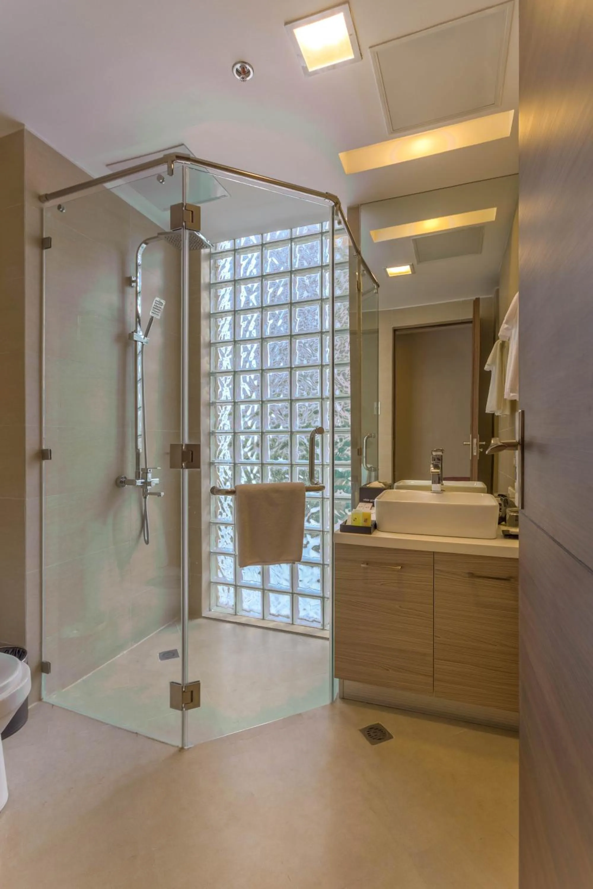 Shower in Valero Grand Suites by Swiss-Belhotel