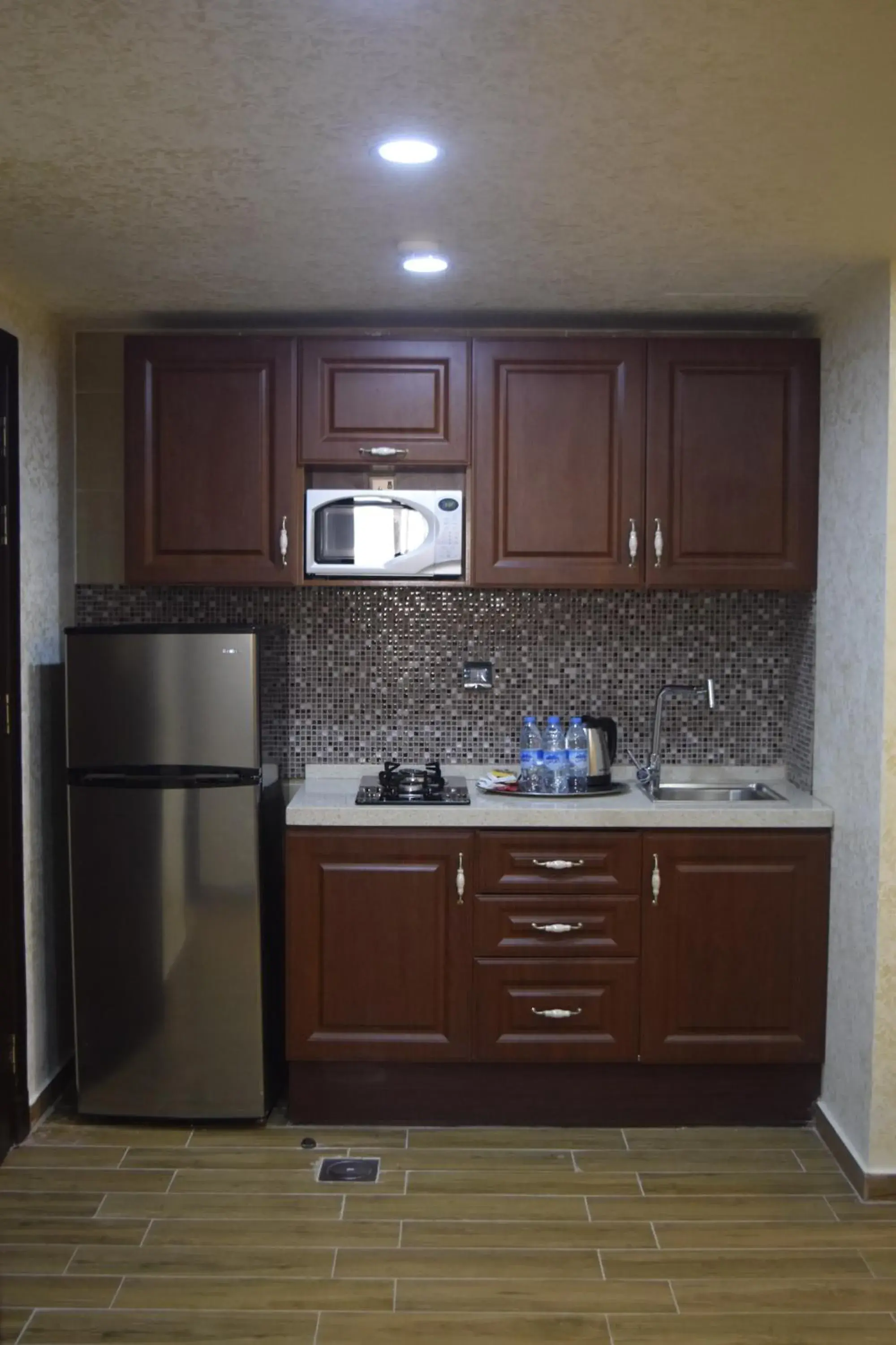 Kitchen or kitchenette, Kitchen/Kitchenette in Aljamal Hotel