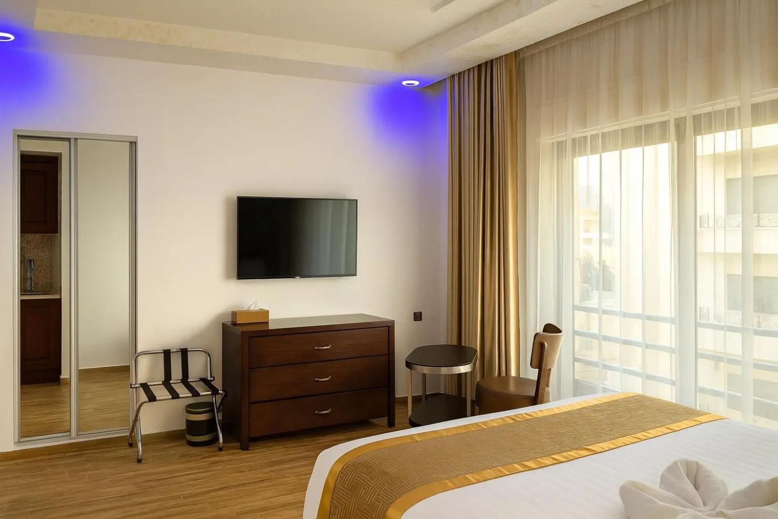 TV and multimedia, Bed in Aljamal Hotel