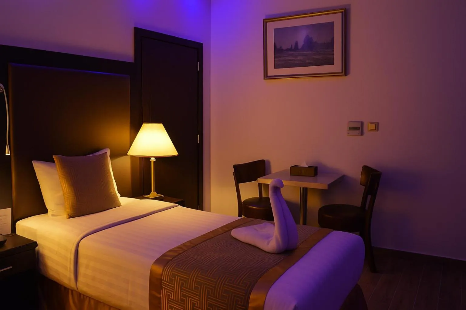 Bed in Aljamal Hotel