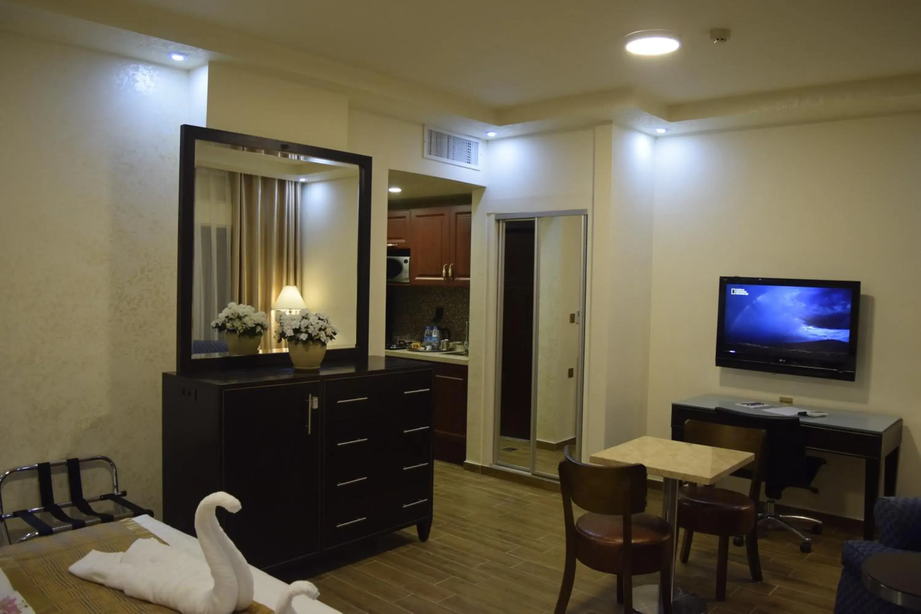 Photo of the whole room, TV/Entertainment Center in Aljamal Hotel