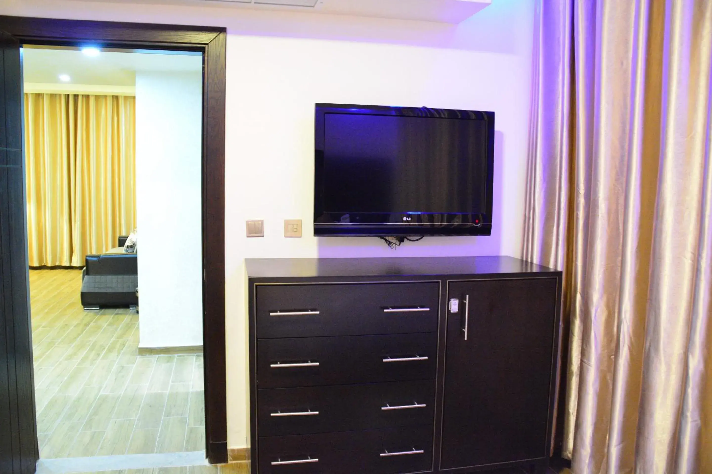 TV and multimedia, TV/Entertainment Center in Aljamal Hotel