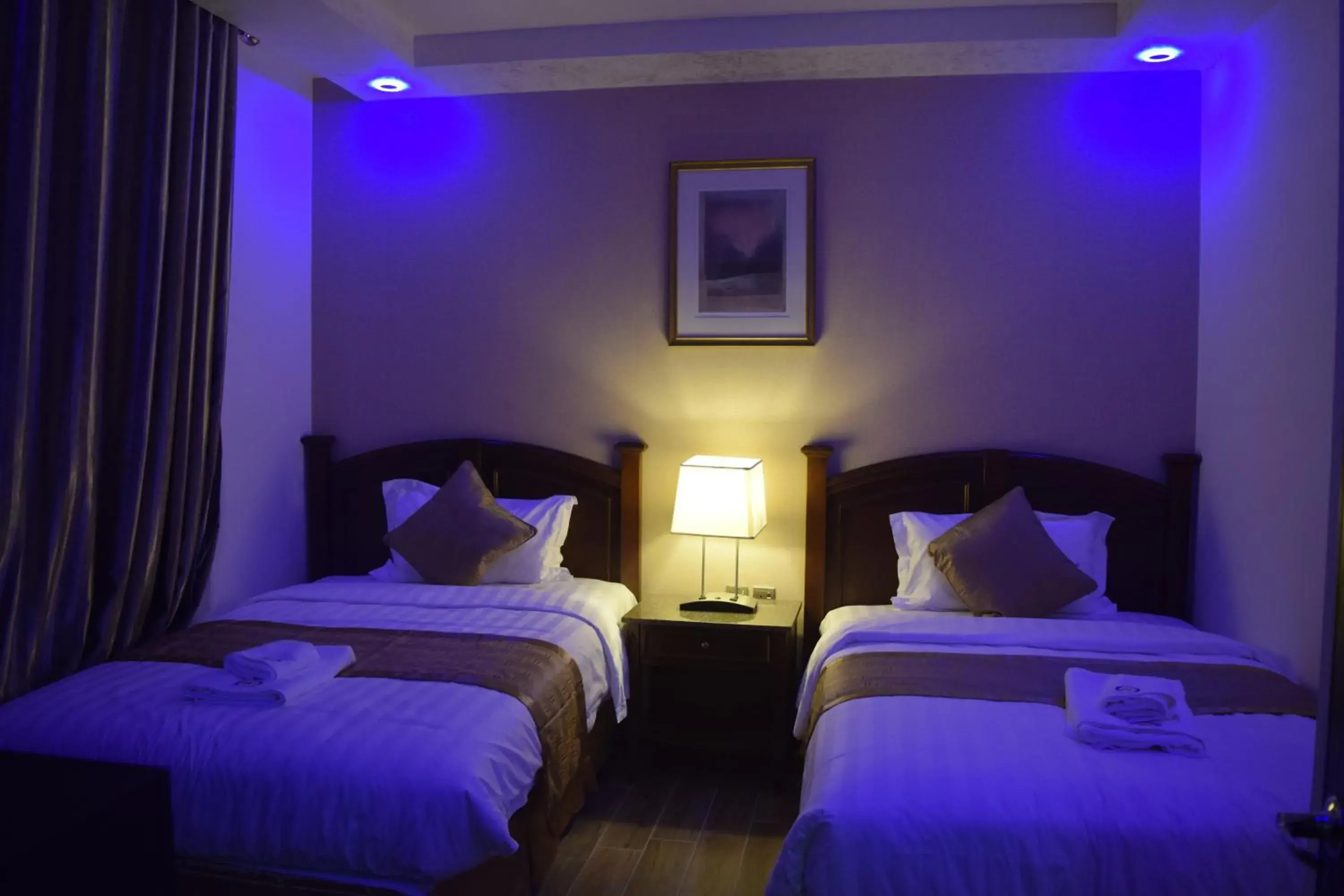 Bed in Aljamal Hotel
