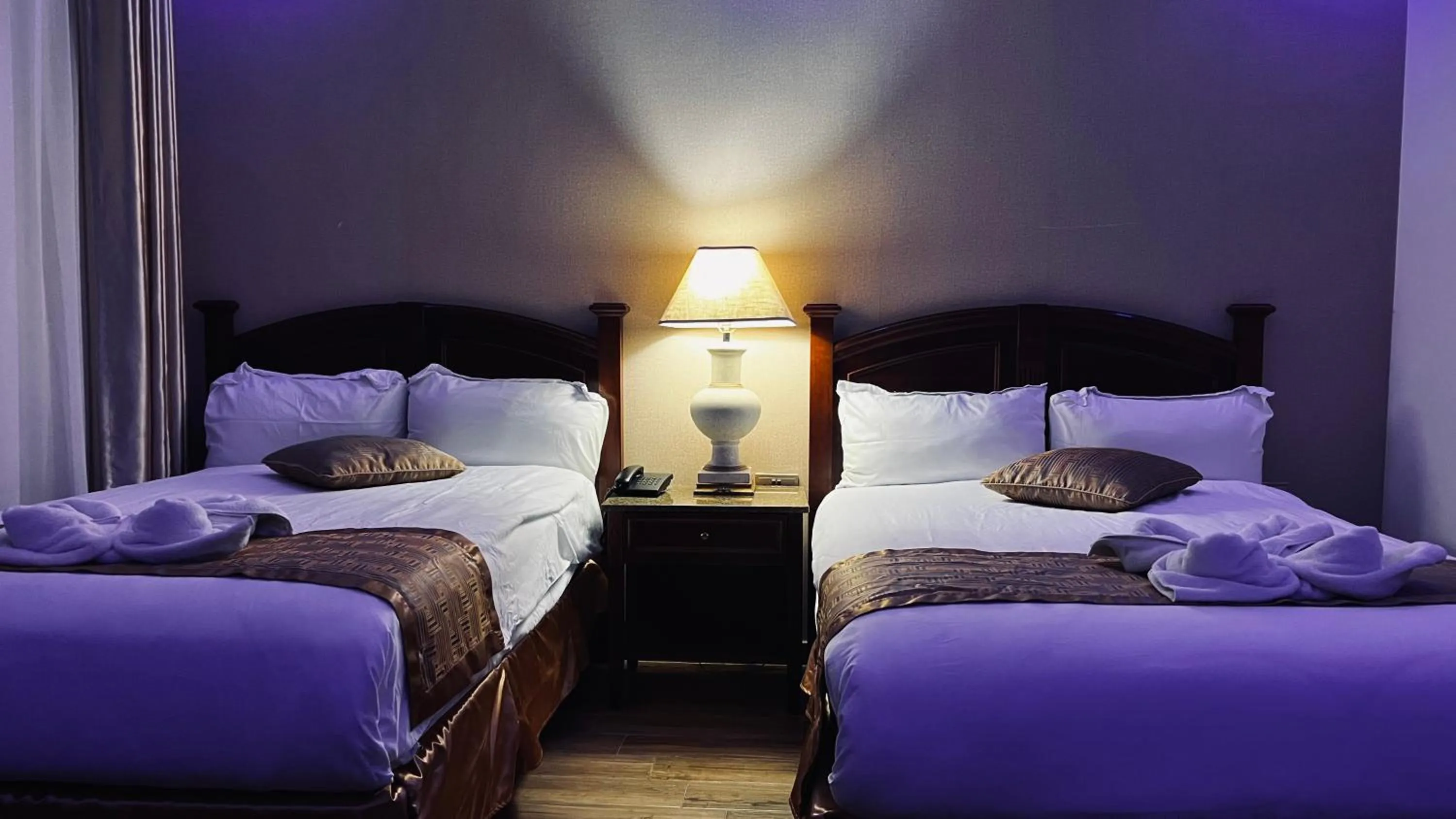 Bed in Aljamal Hotel