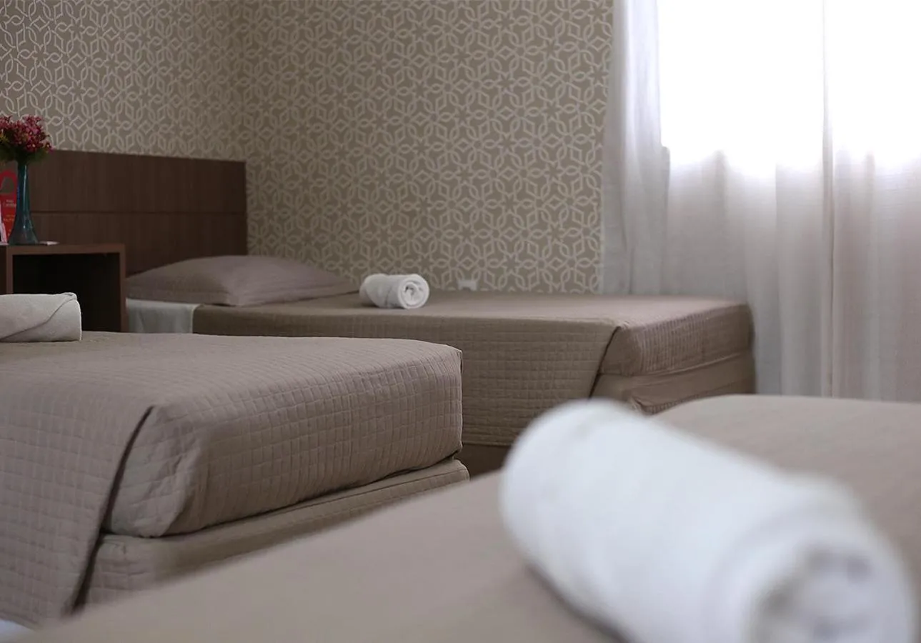 Bed in Hotel Caroline