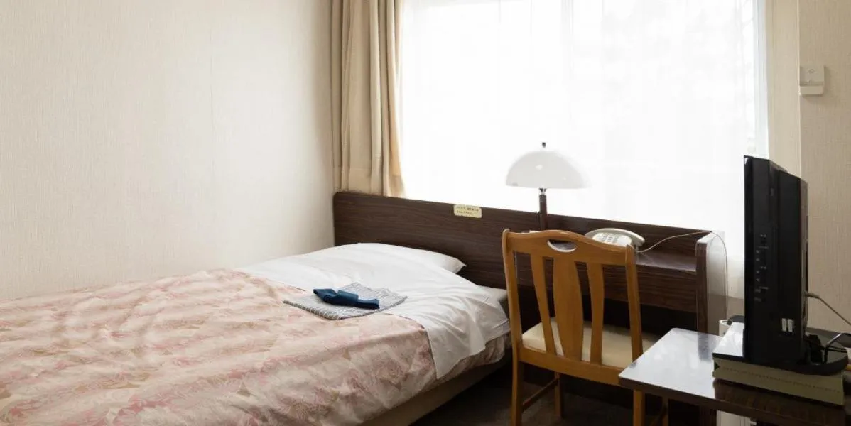 Bed in Business Hotel Heisei
