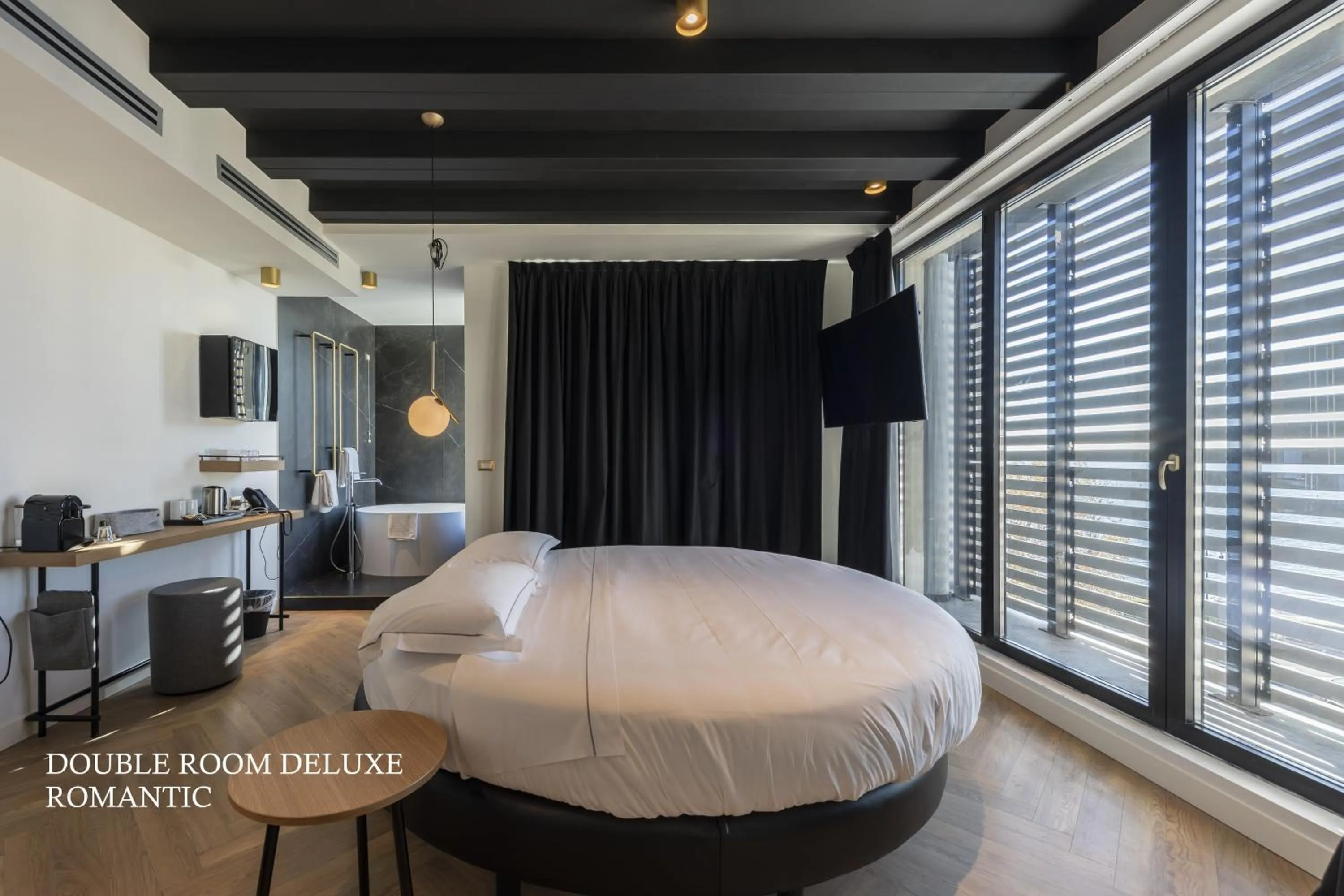 Bed in MaisonMe Boutique Hotel