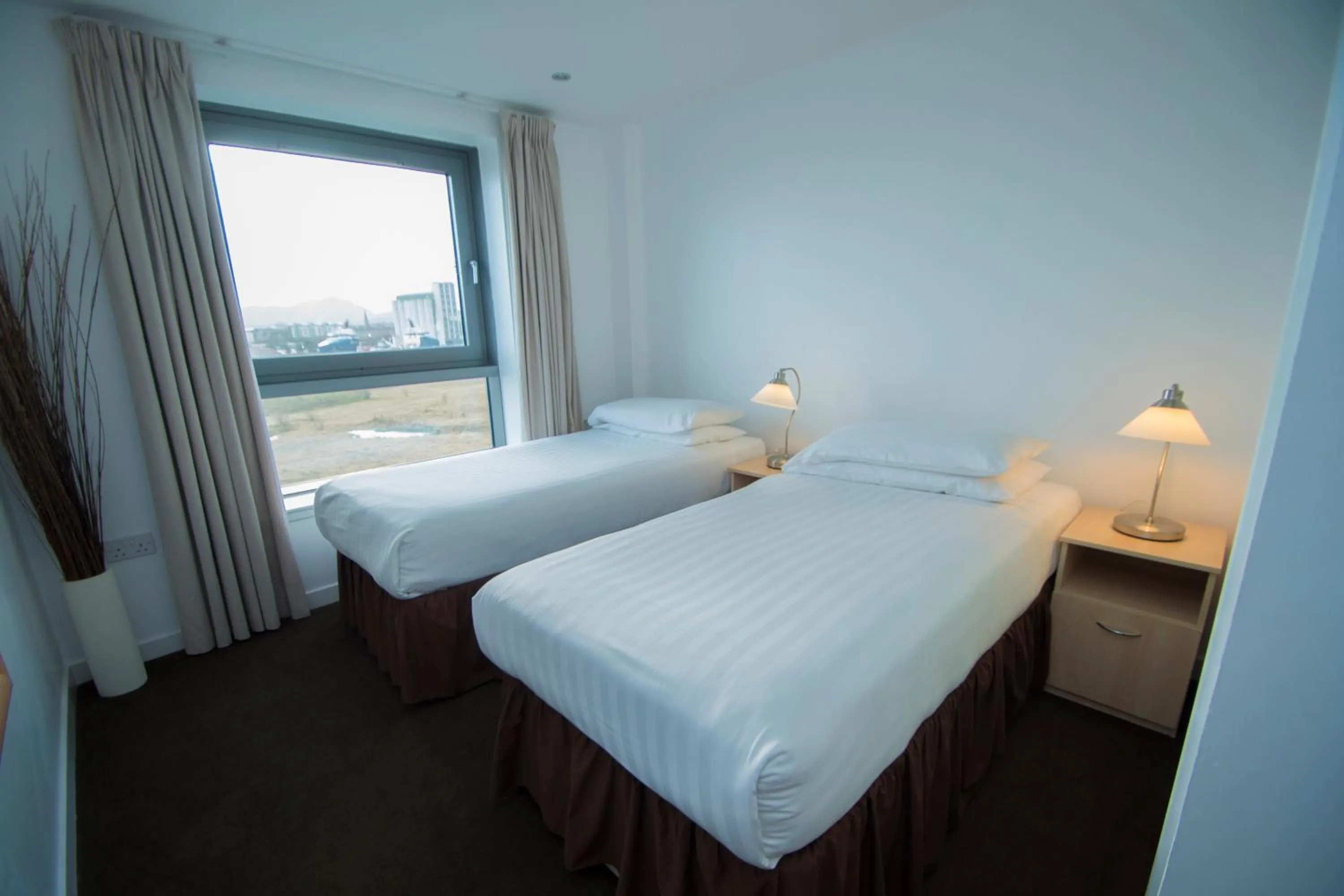 Bedroom, Bed in Ocean Serviced Apartments