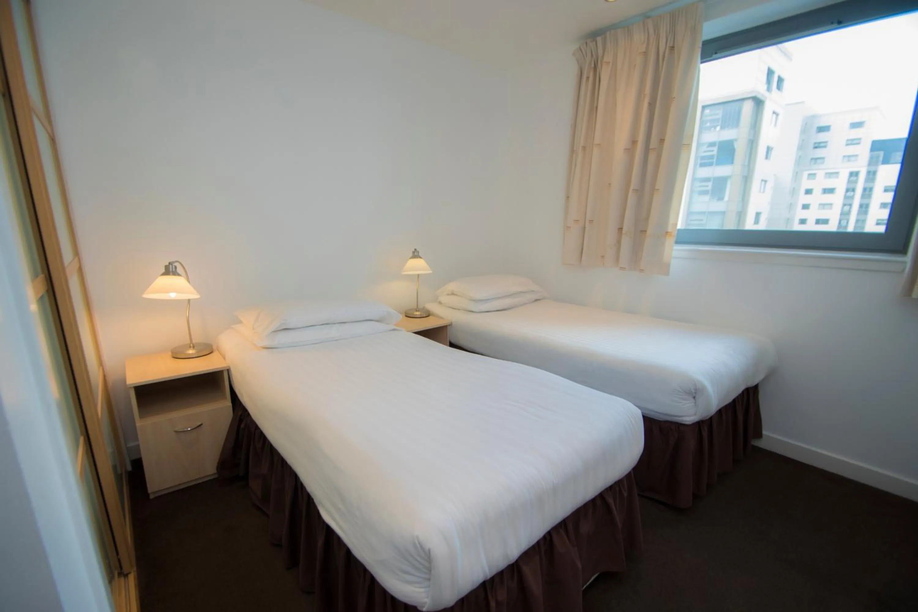 Bedroom, Bed in Ocean Serviced Apartments