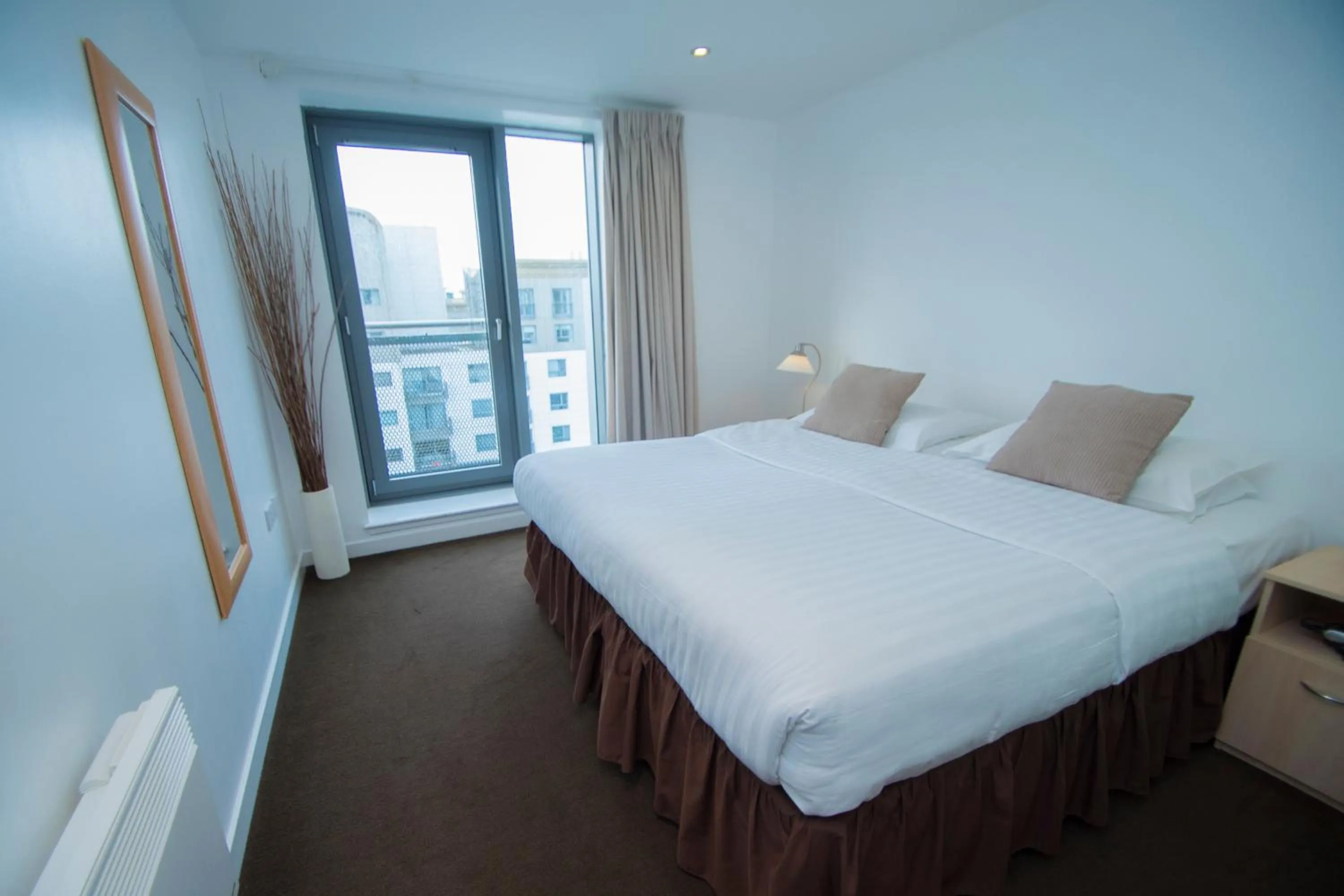 Bedroom, Bed in Ocean Serviced Apartments