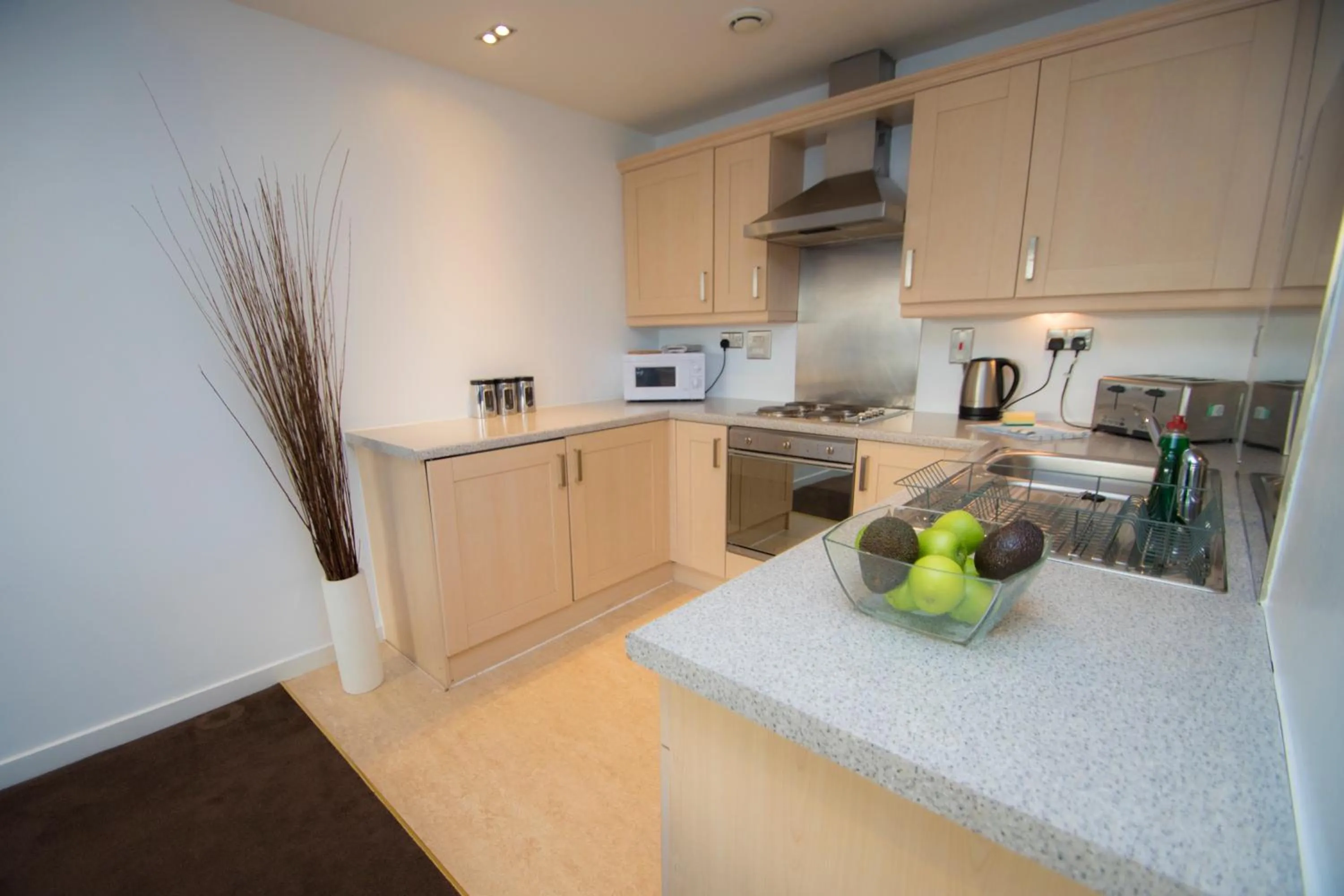 Kitchen or kitchenette in Ocean Serviced Apartments
