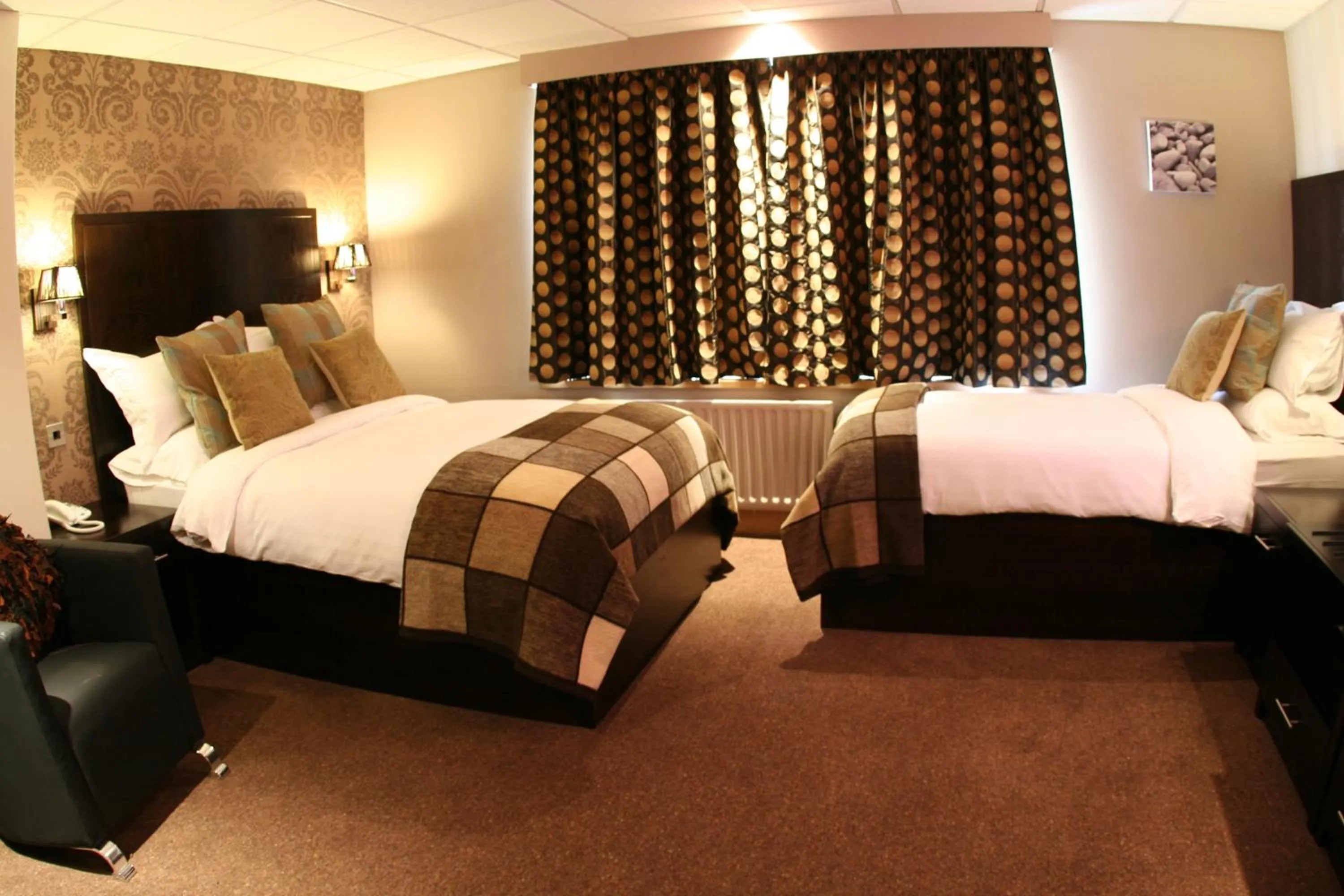 Bed in Inn On The Prom At The Fernlea Hotel