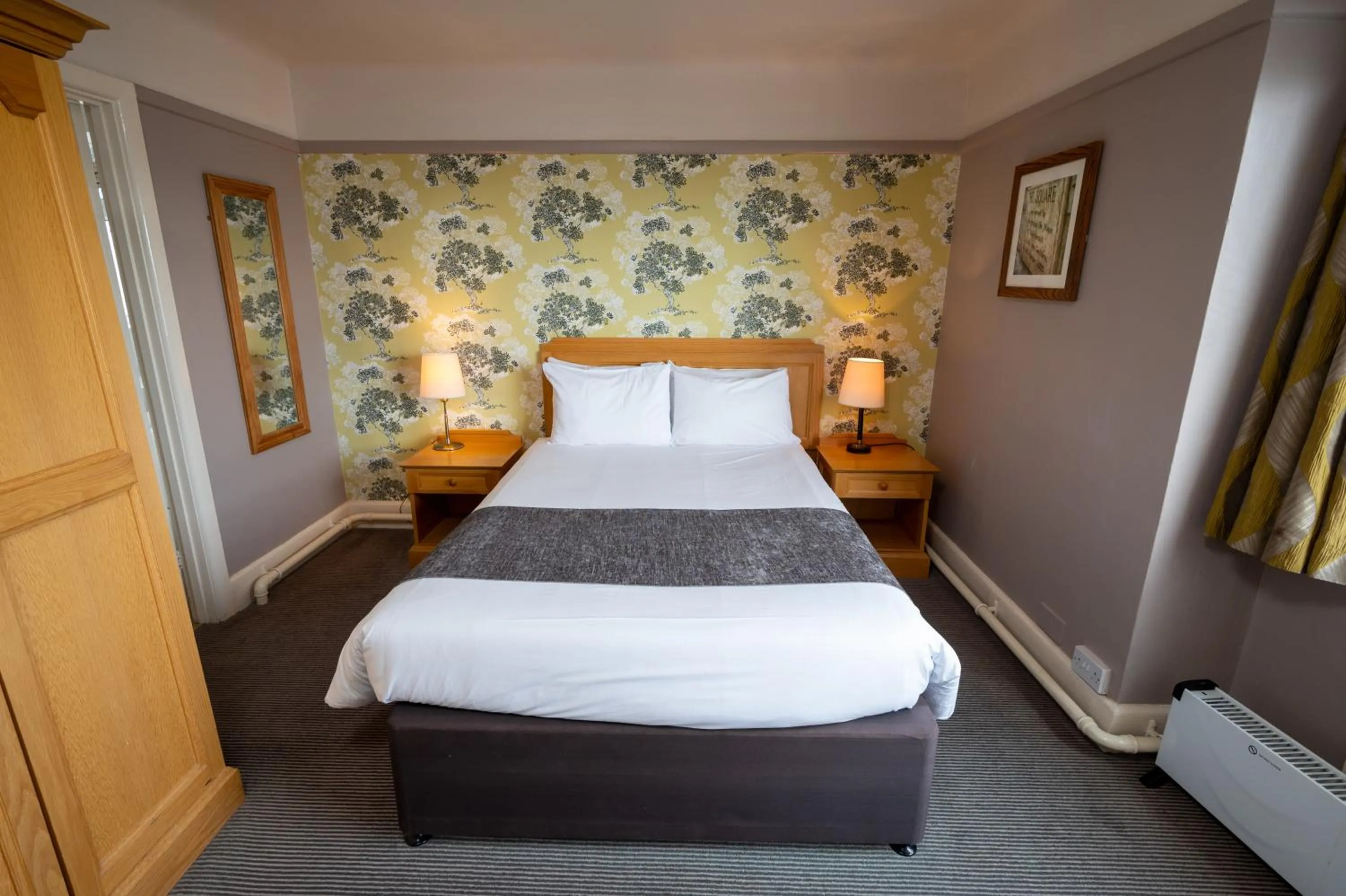 Bedroom, Bed in Commodore Hotel by Greene King Inns