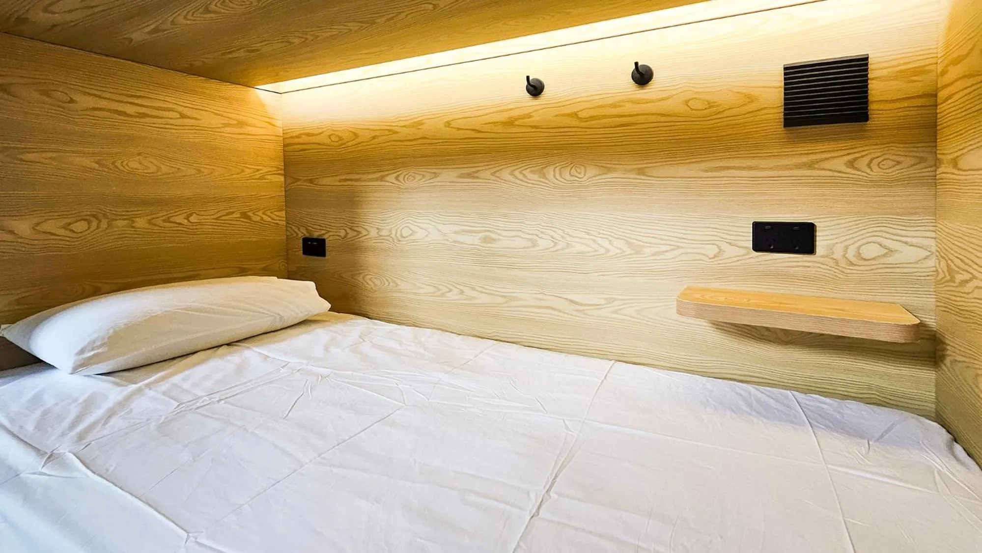 Bed in The Capsule Hotel