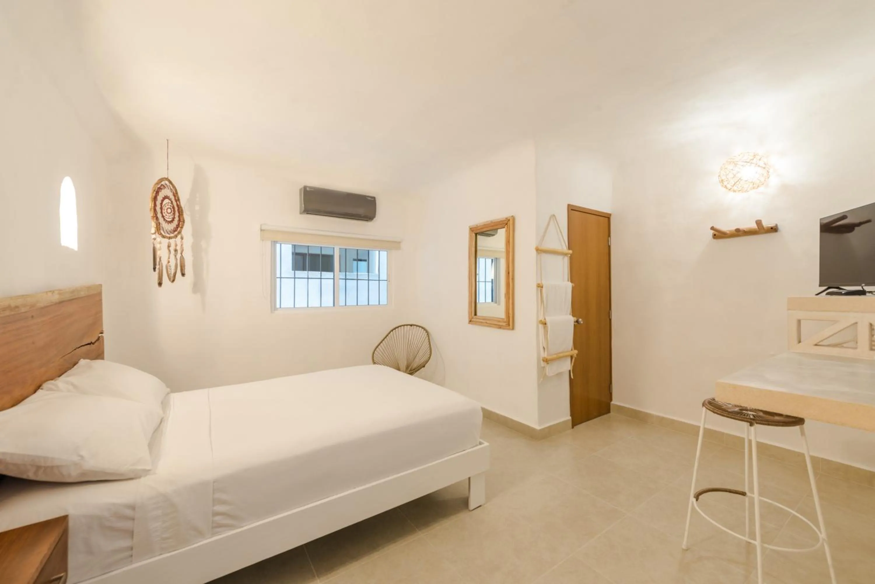 Bed in Hotel Caracol Puerto Morelos