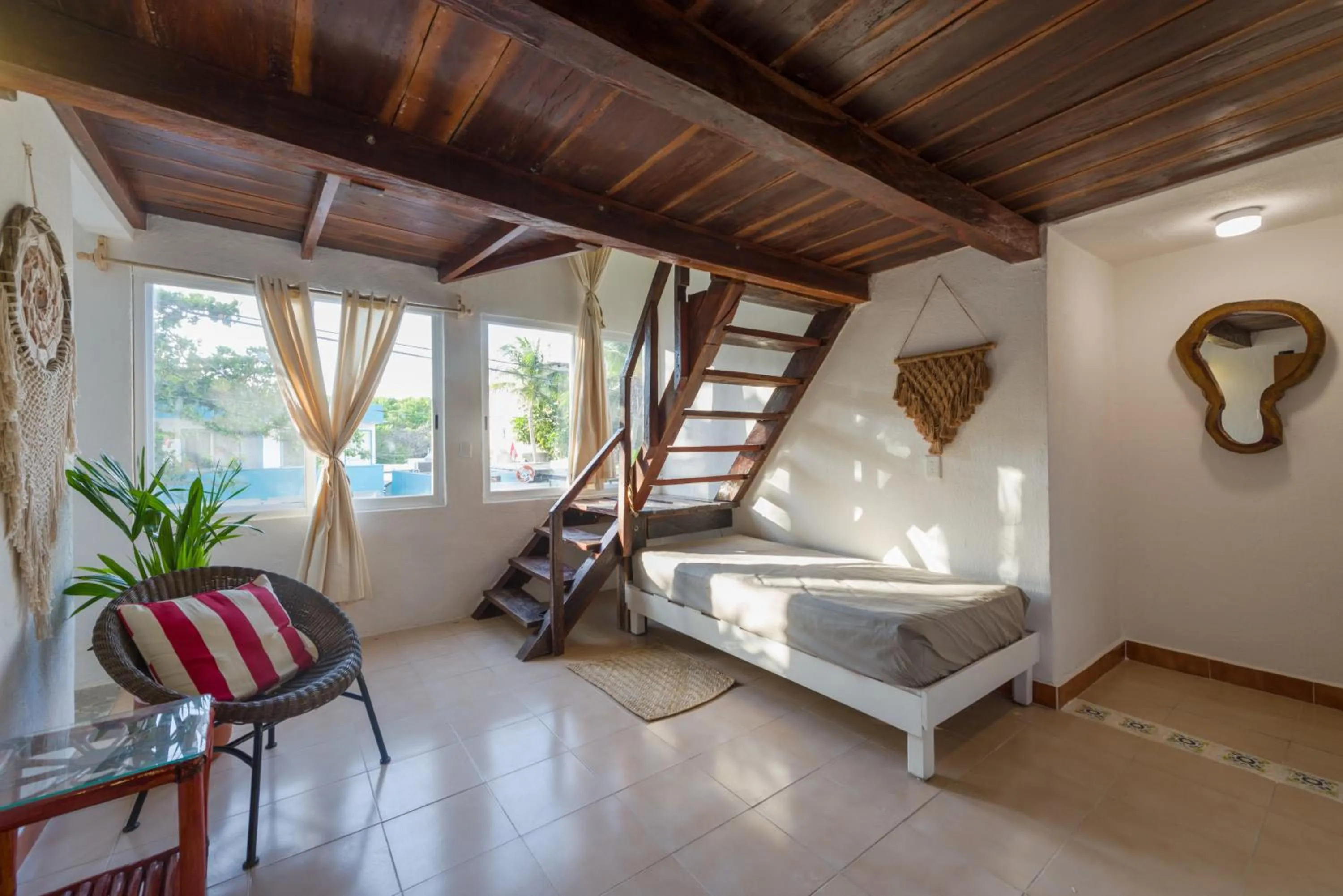 Living room in Hotel Caracol Puerto Morelos