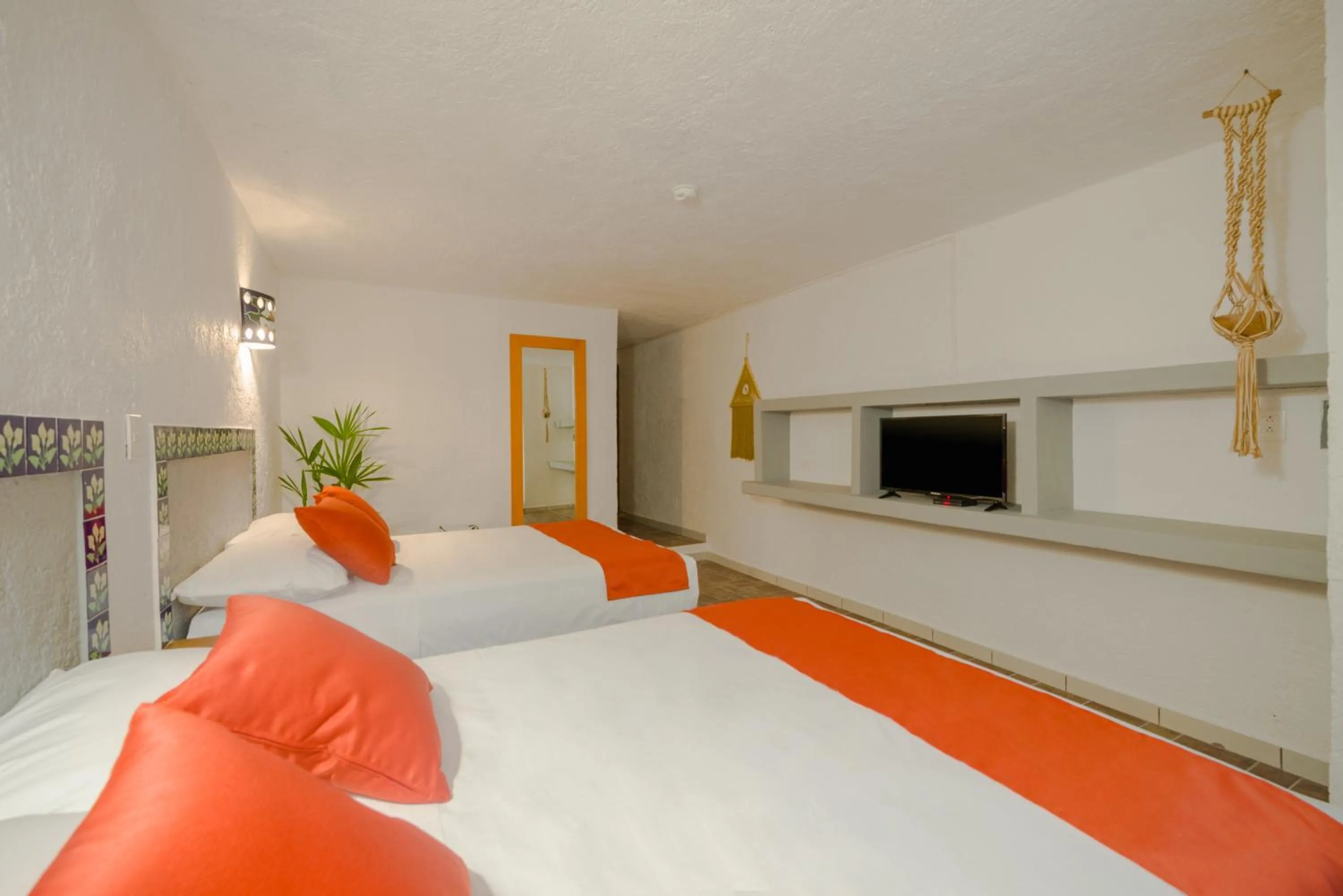 Bed in Hotel Caracol Puerto Morelos