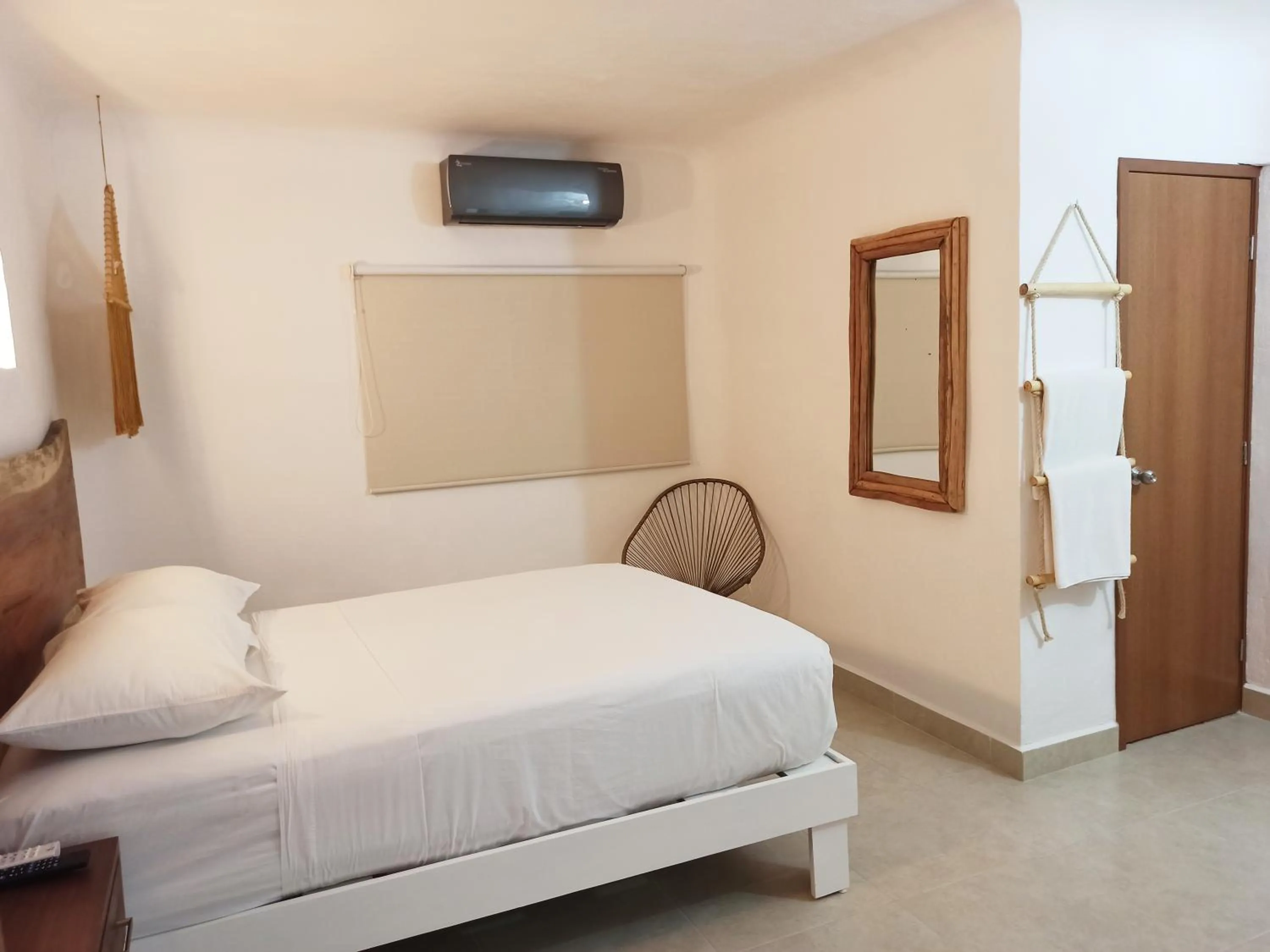 Bed in Hotel Caracol Puerto Morelos
