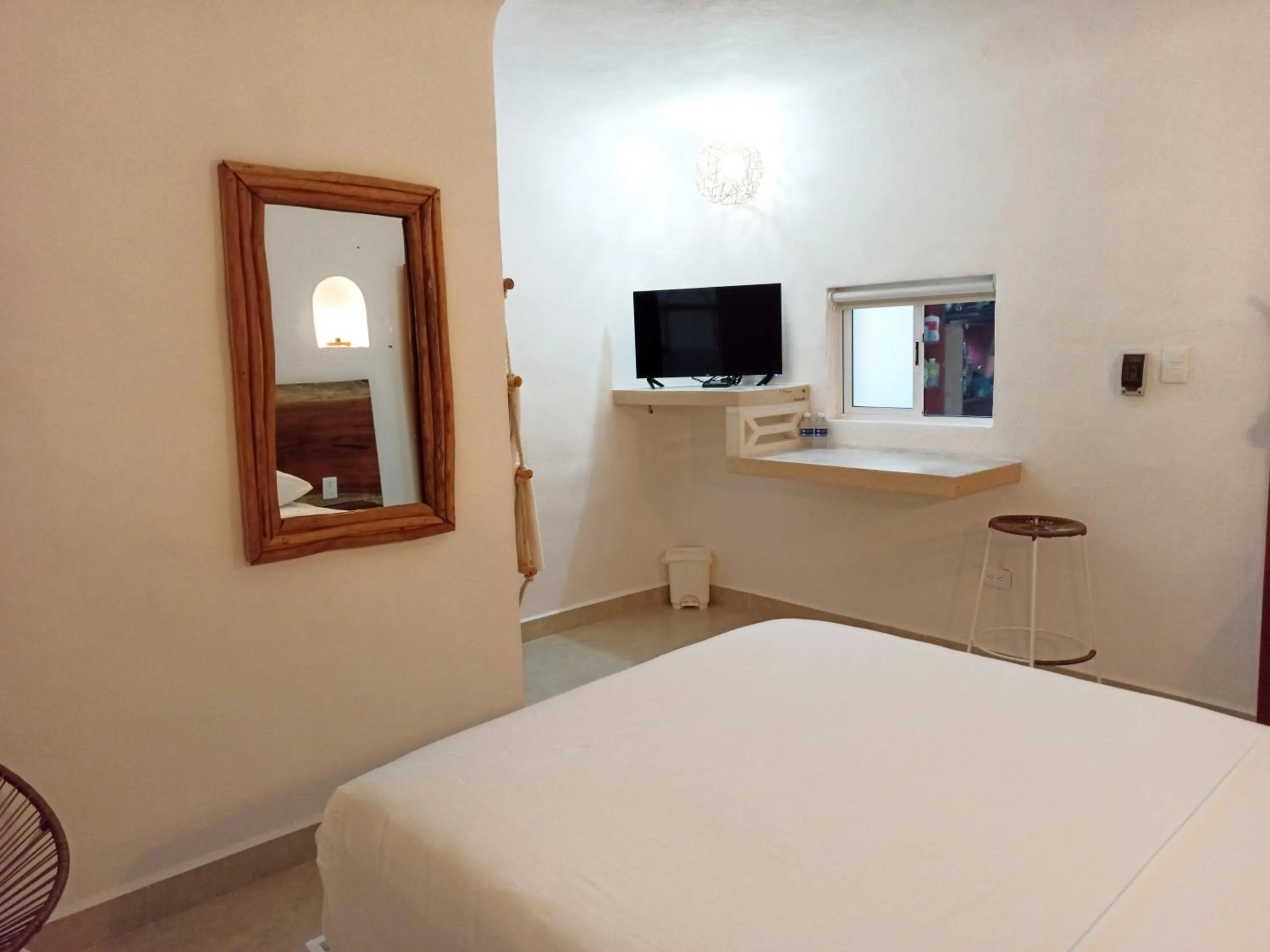 Bed in Hotel Caracol Puerto Morelos