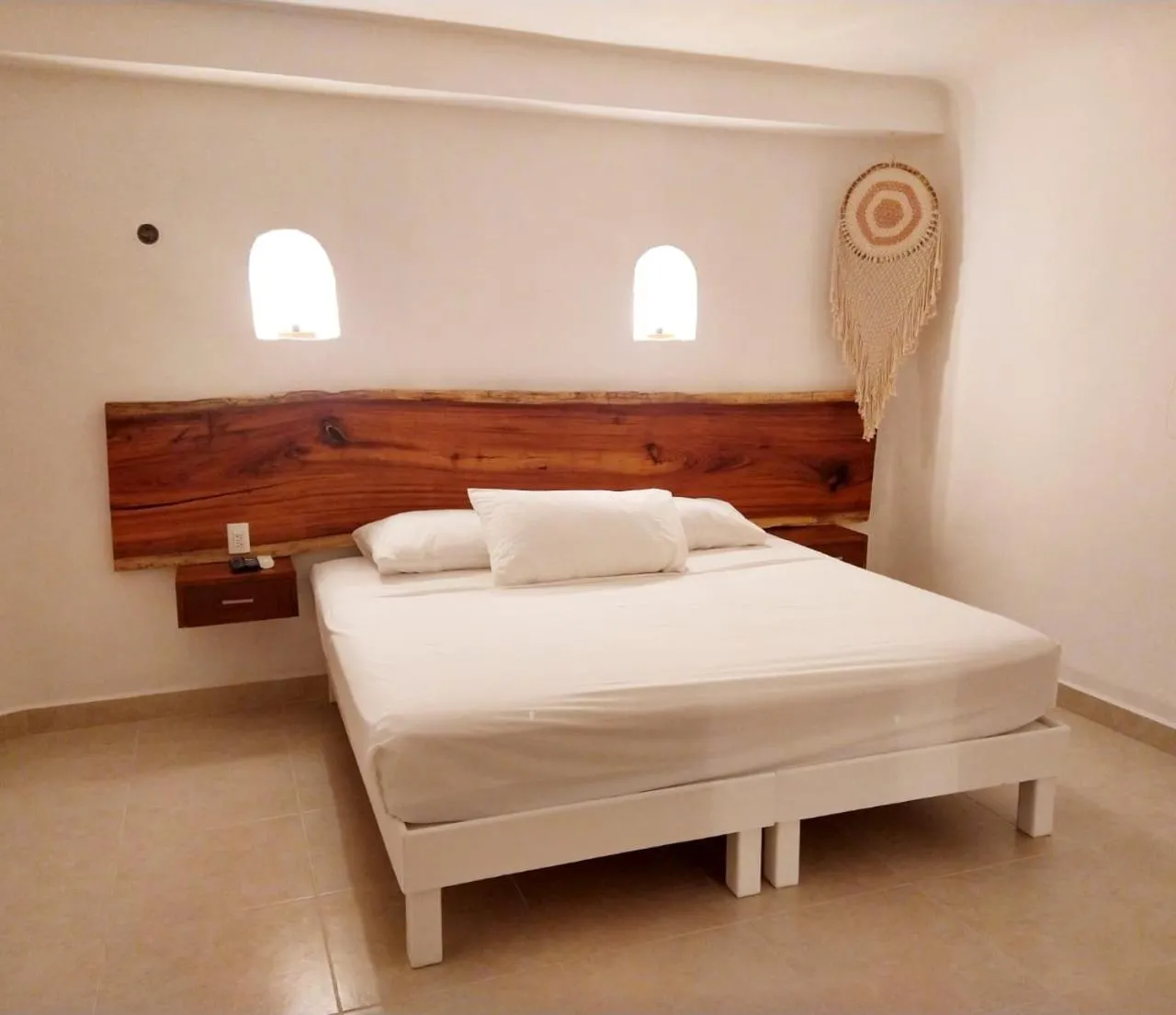 Bed in Hotel Caracol Puerto Morelos