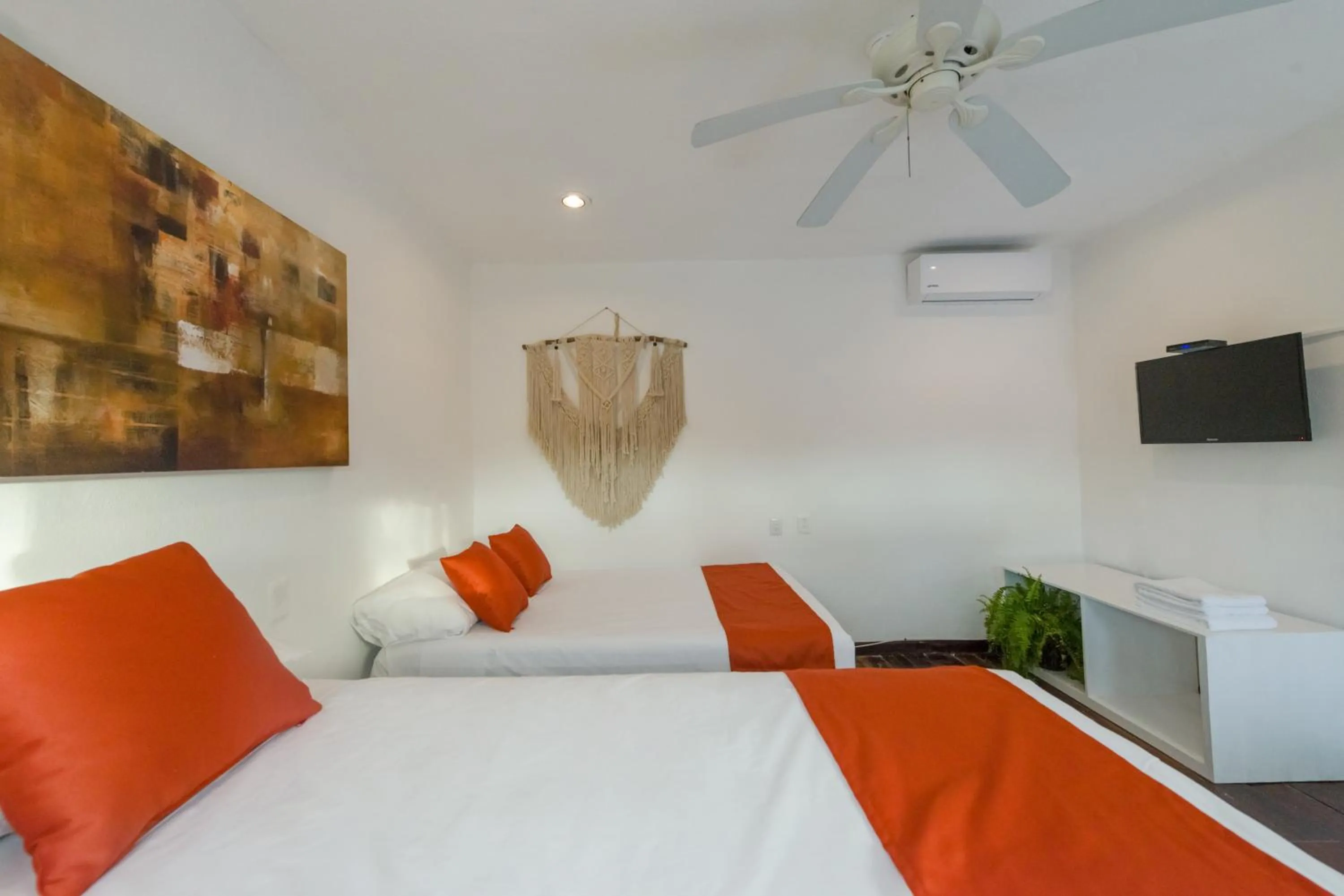 Bed in Hotel Caracol Puerto Morelos