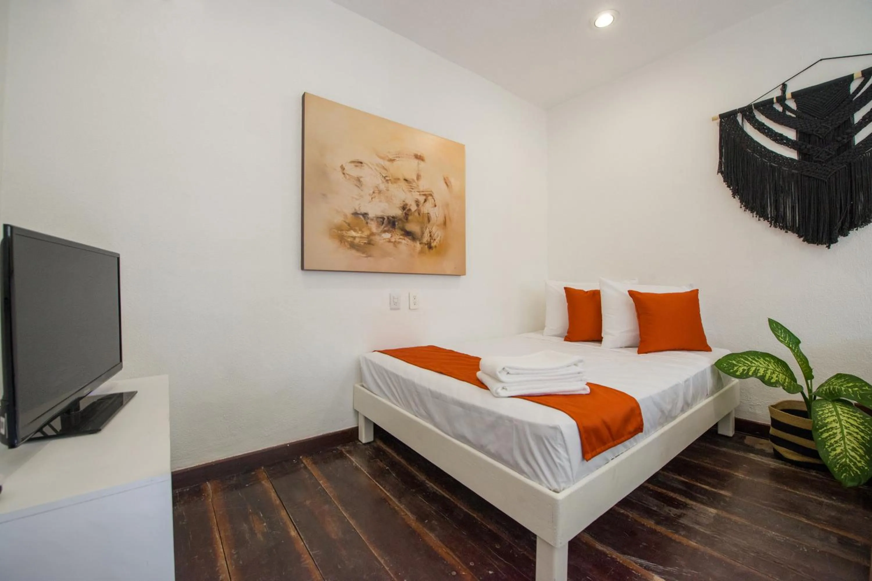 Bed in Hotel Caracol Puerto Morelos