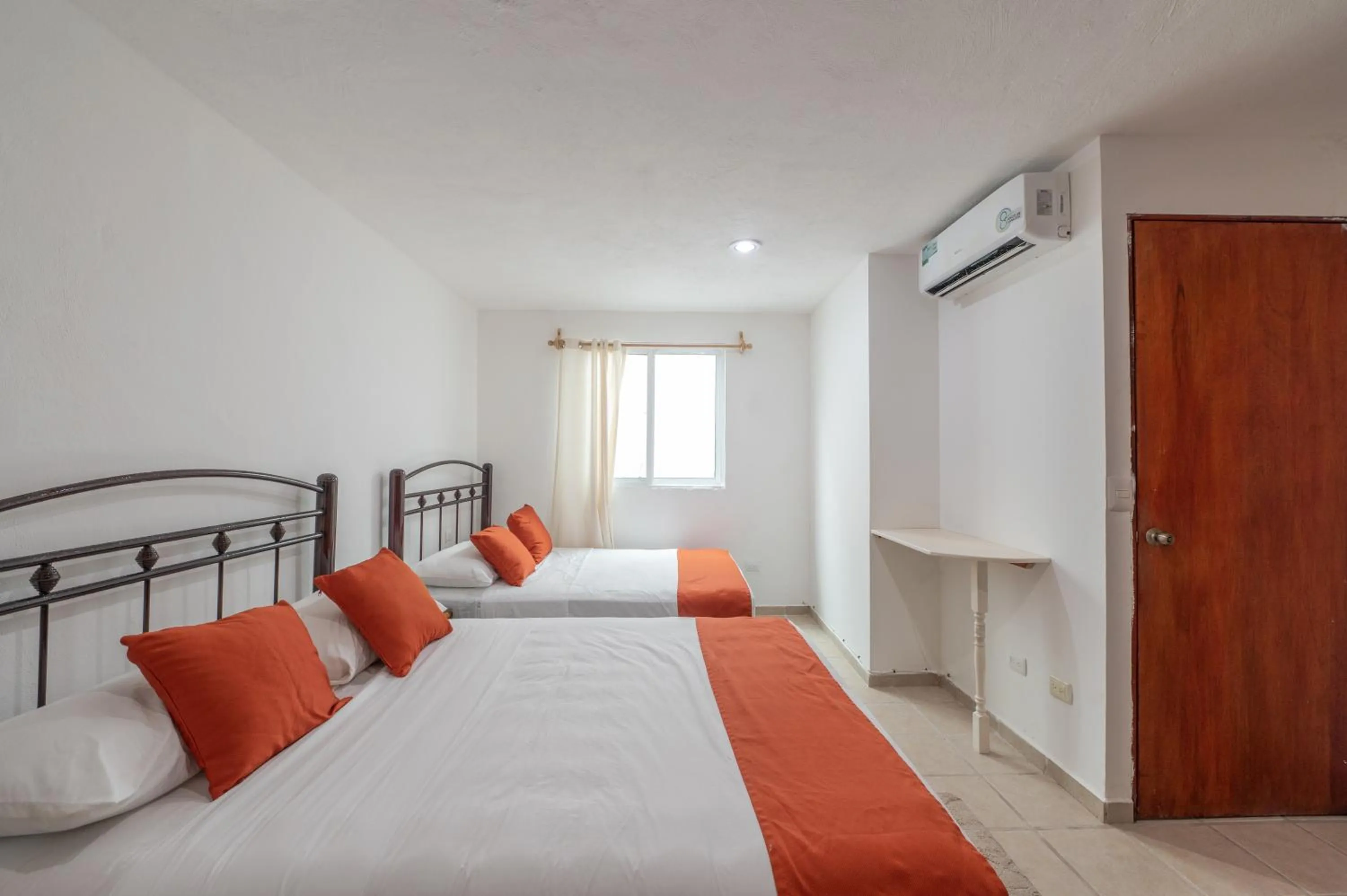 Bed in Hotel Caracol Puerto Morelos