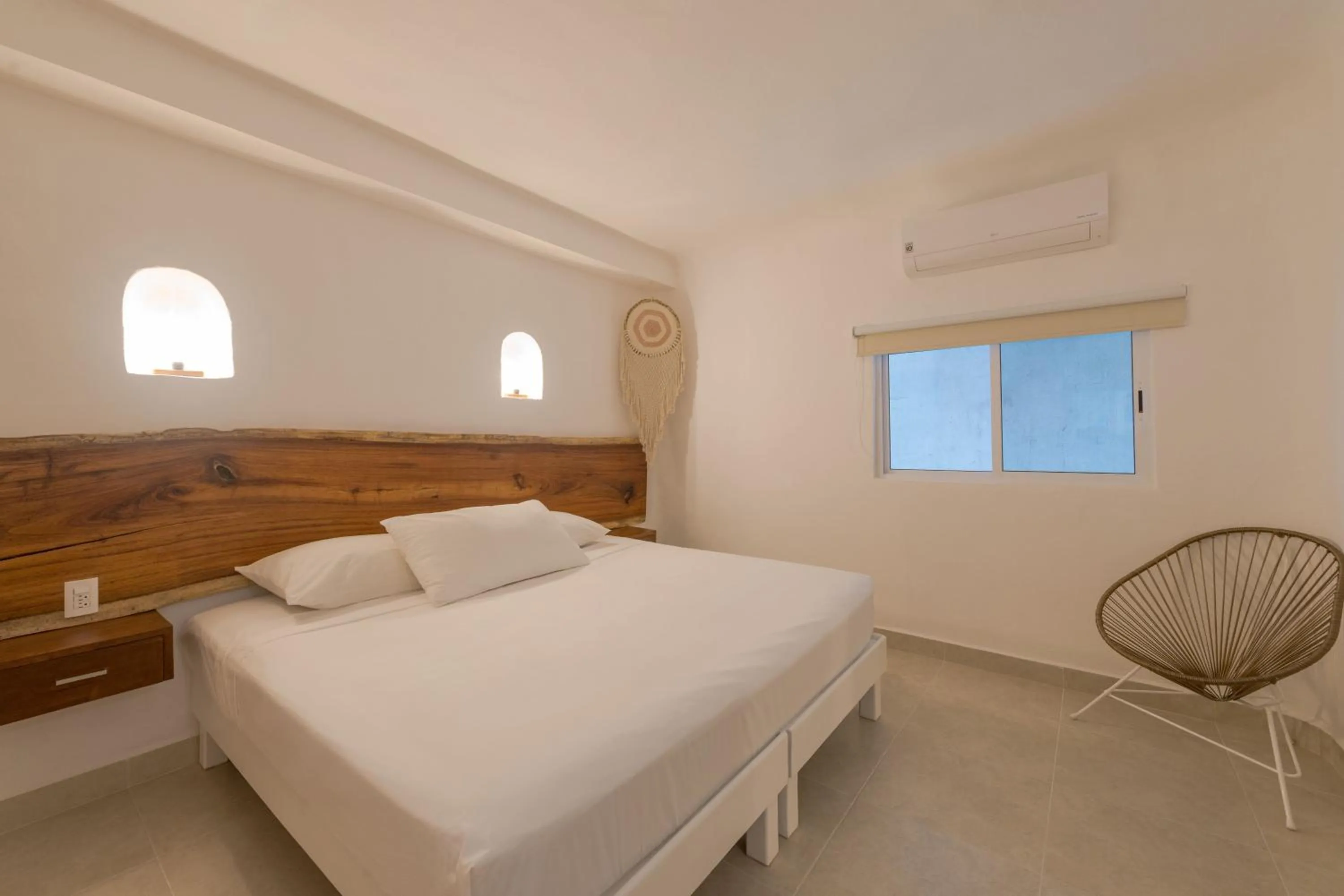 Bedroom, Bed in Hotel Caracol Puerto Morelos