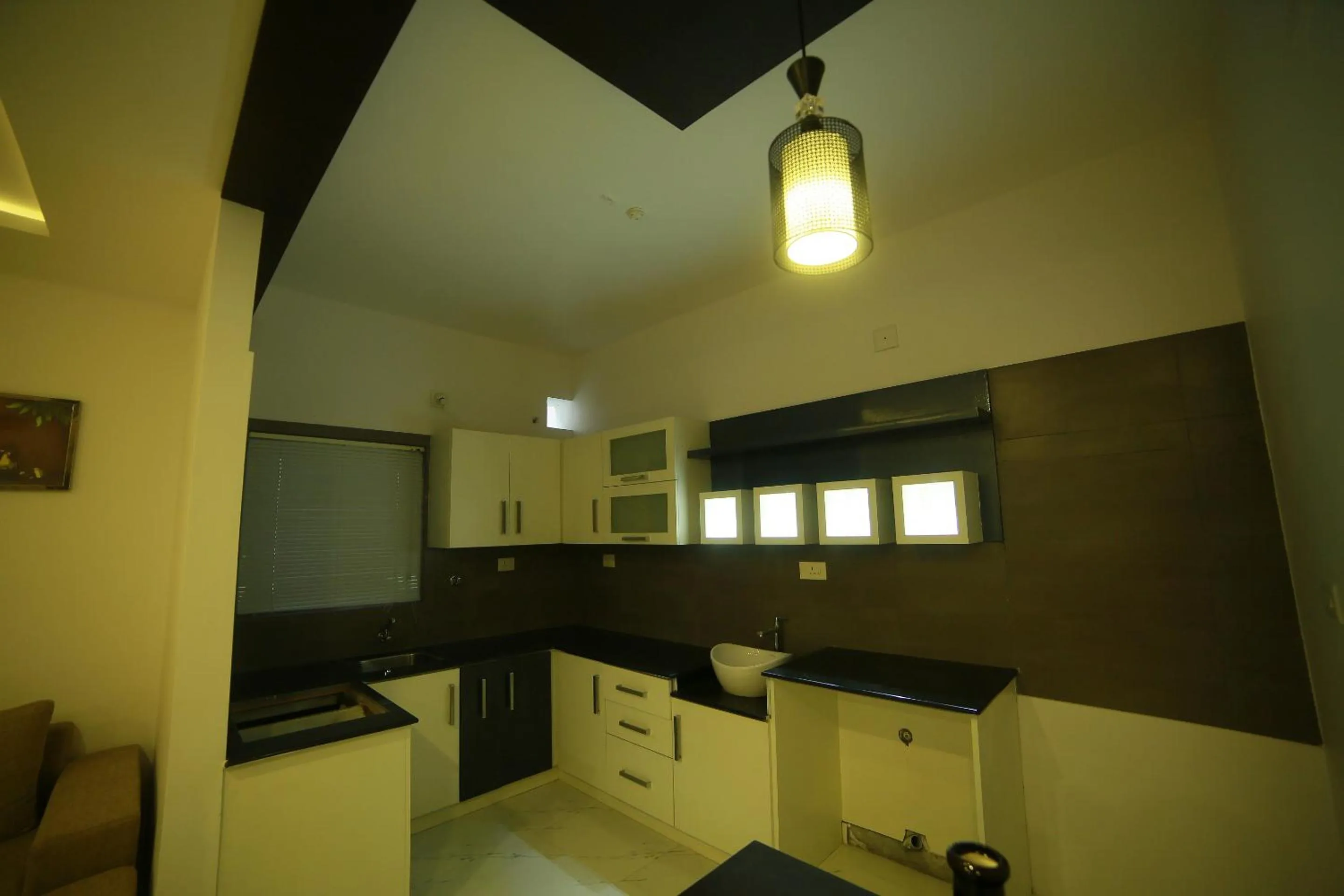 Kitchen or kitchenette in SRM Tower Residency