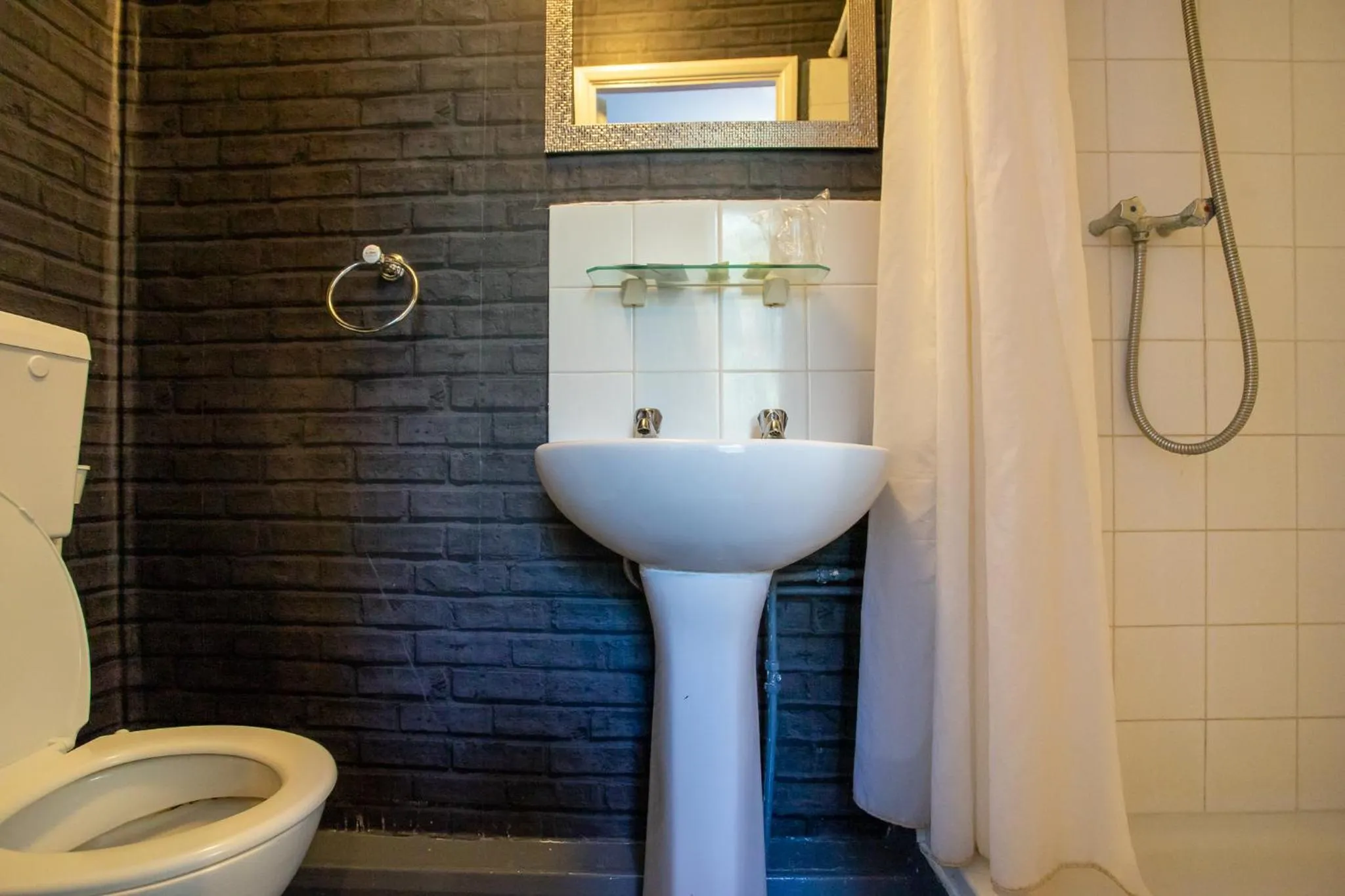 Shower in The Carlton Hotel