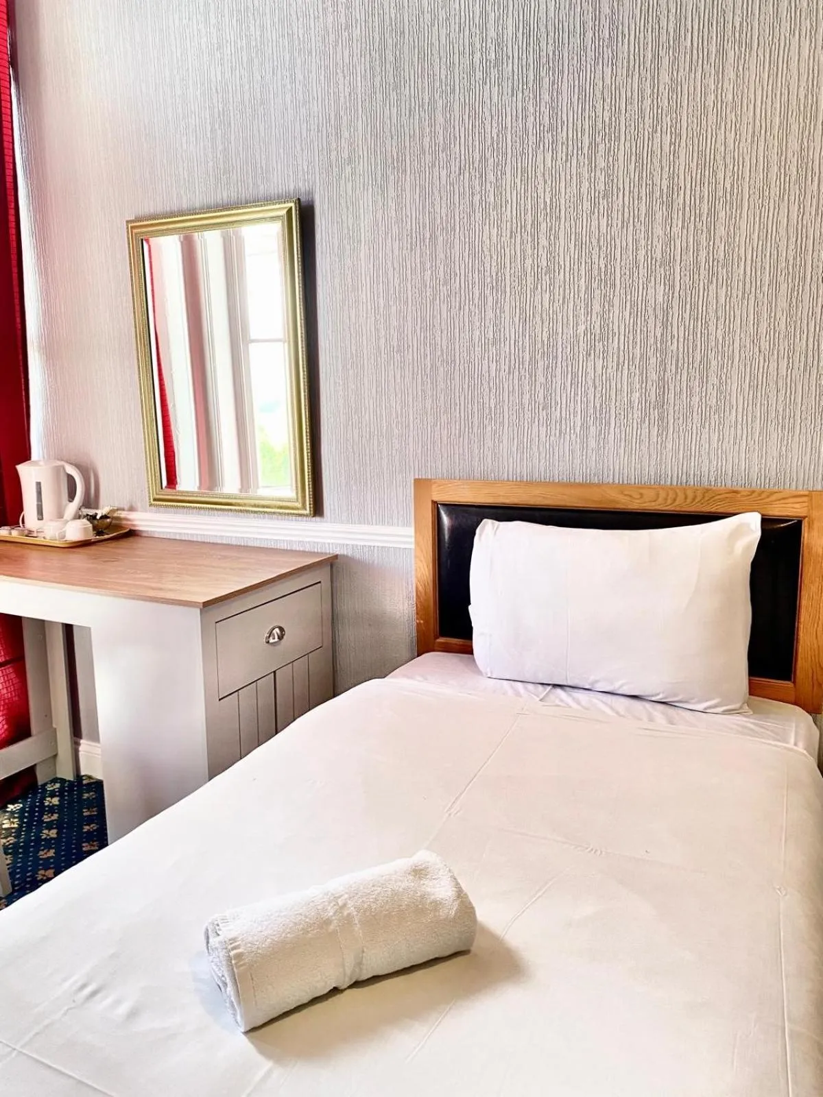 Bed in The Carlton Hotel