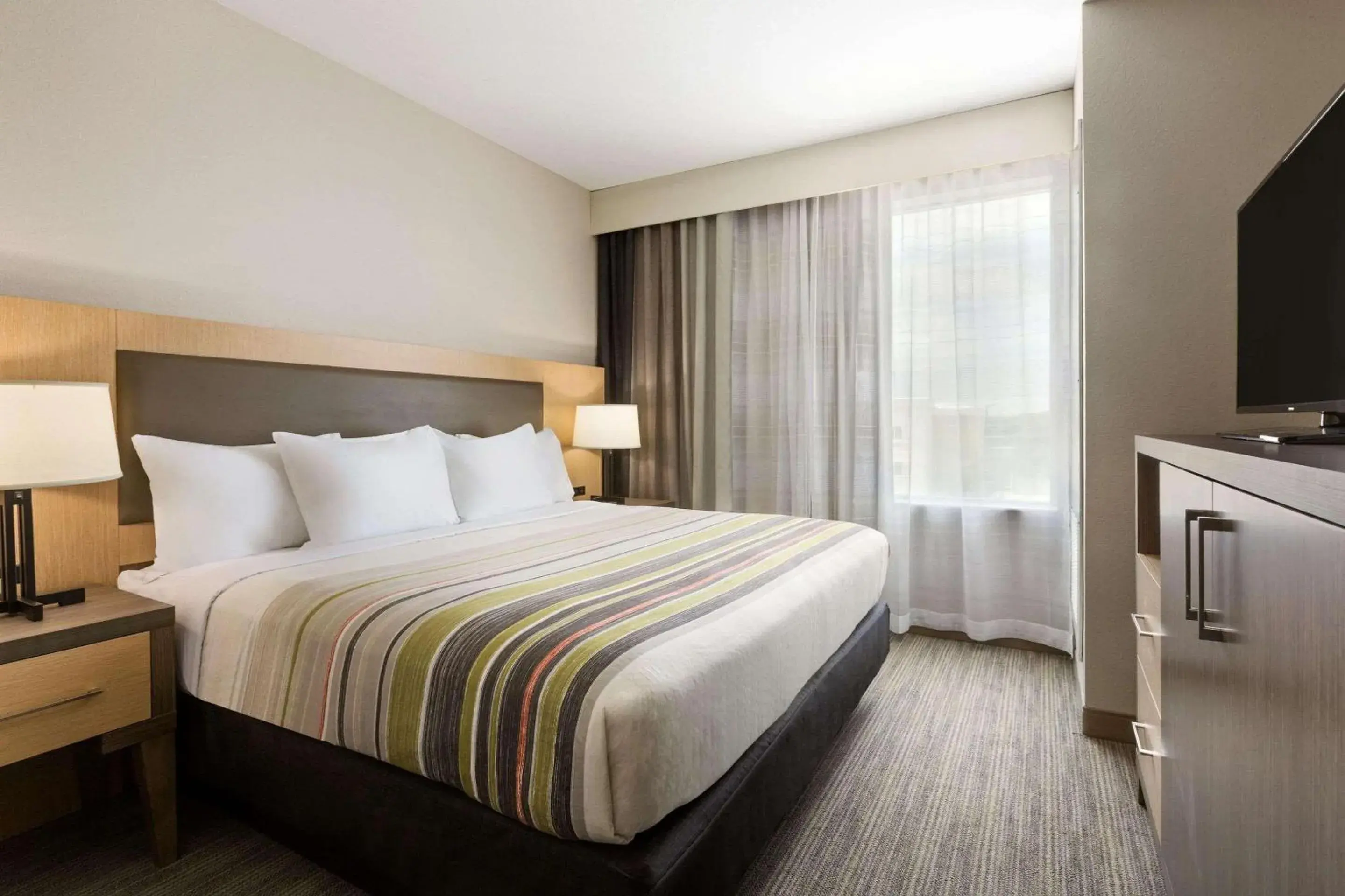 Bedroom, Bed in Country Inn & Suites by Radisson, New Braunfels, TX Bedroom, Bed in Country Inn & Suites by Radisson, New Braunfels, TX