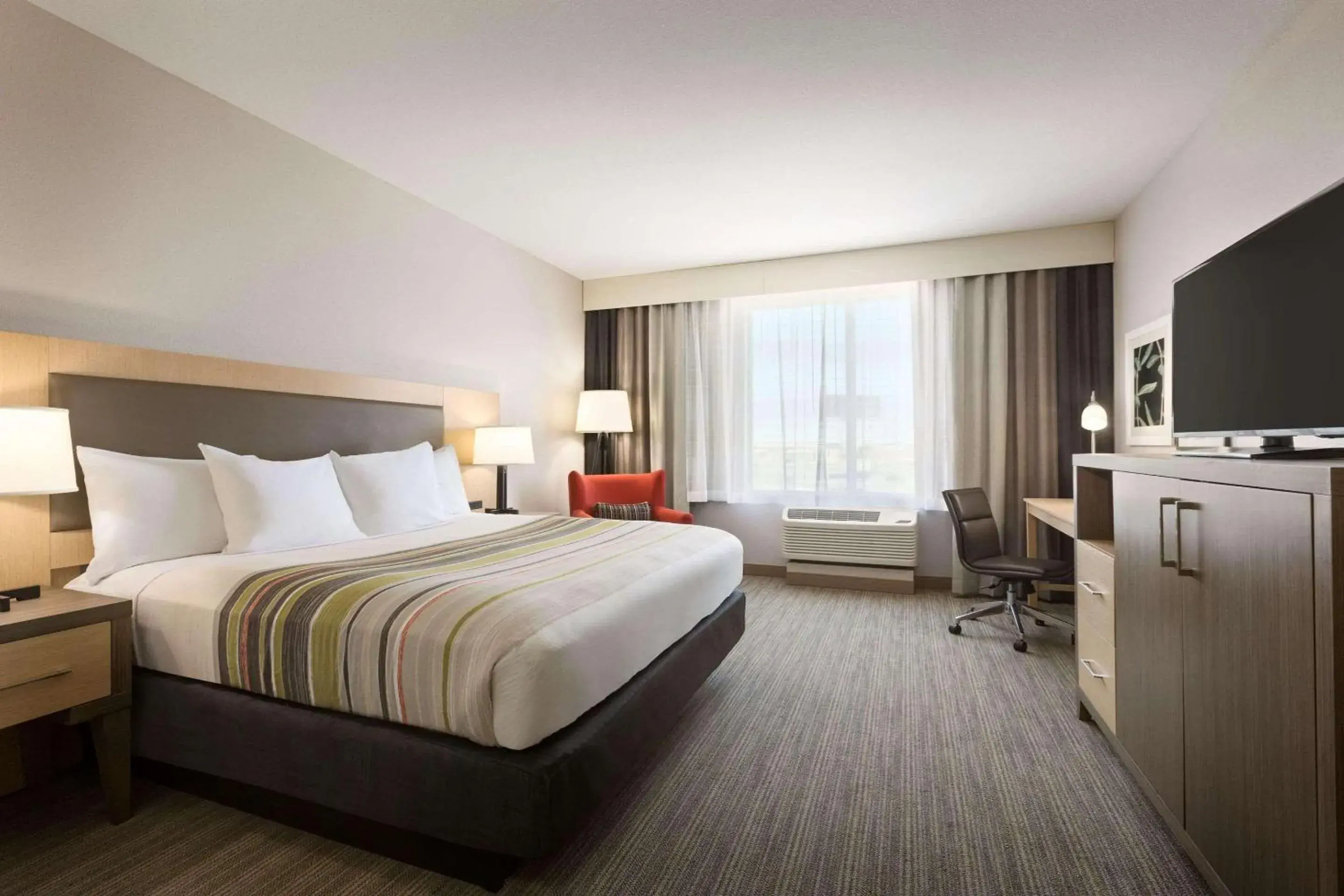 Bedroom, Bed in Country Inn & Suites by Radisson, New Braunfels, TX Bedroom, Bed in Country Inn & Suites by Radisson, New Braunfels, TX