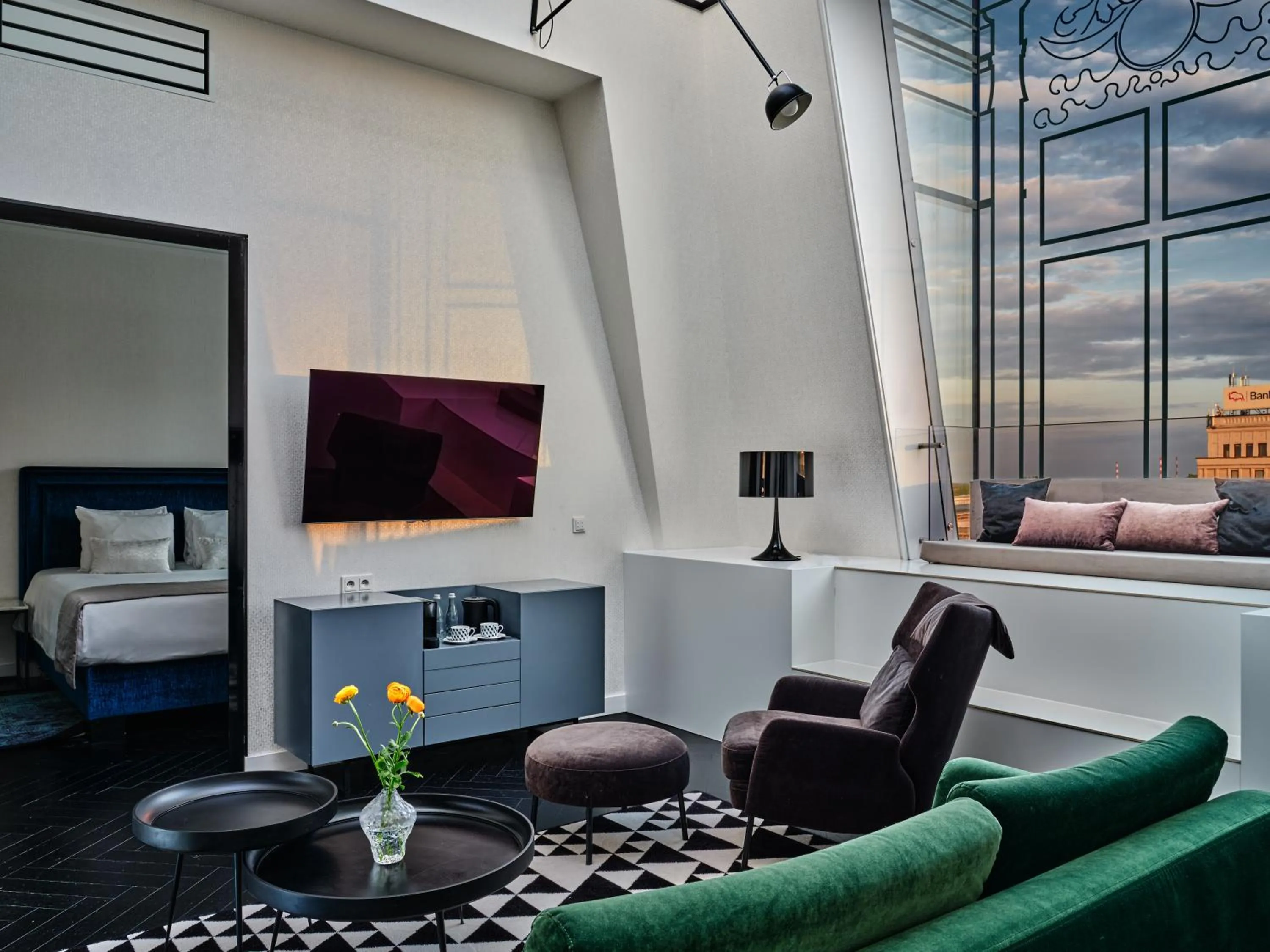 Communal lounge/ TV room in Hotel Indigo Warsaw Nowy Świat by IHG