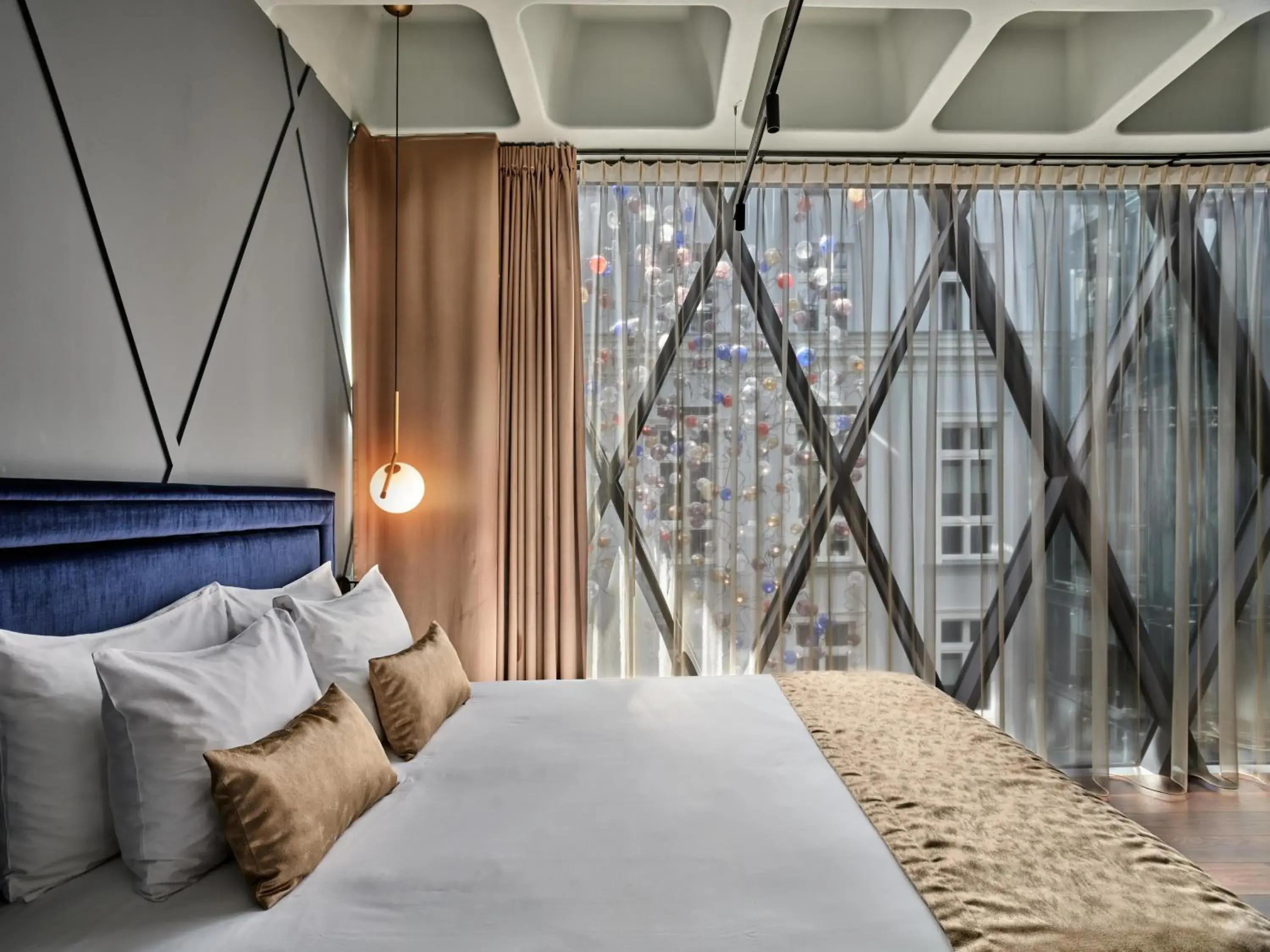 Bed in Hotel Indigo Warsaw Nowy Świat by IHG Bed in Hotel Indigo Warsaw Nowy Świat by IHG