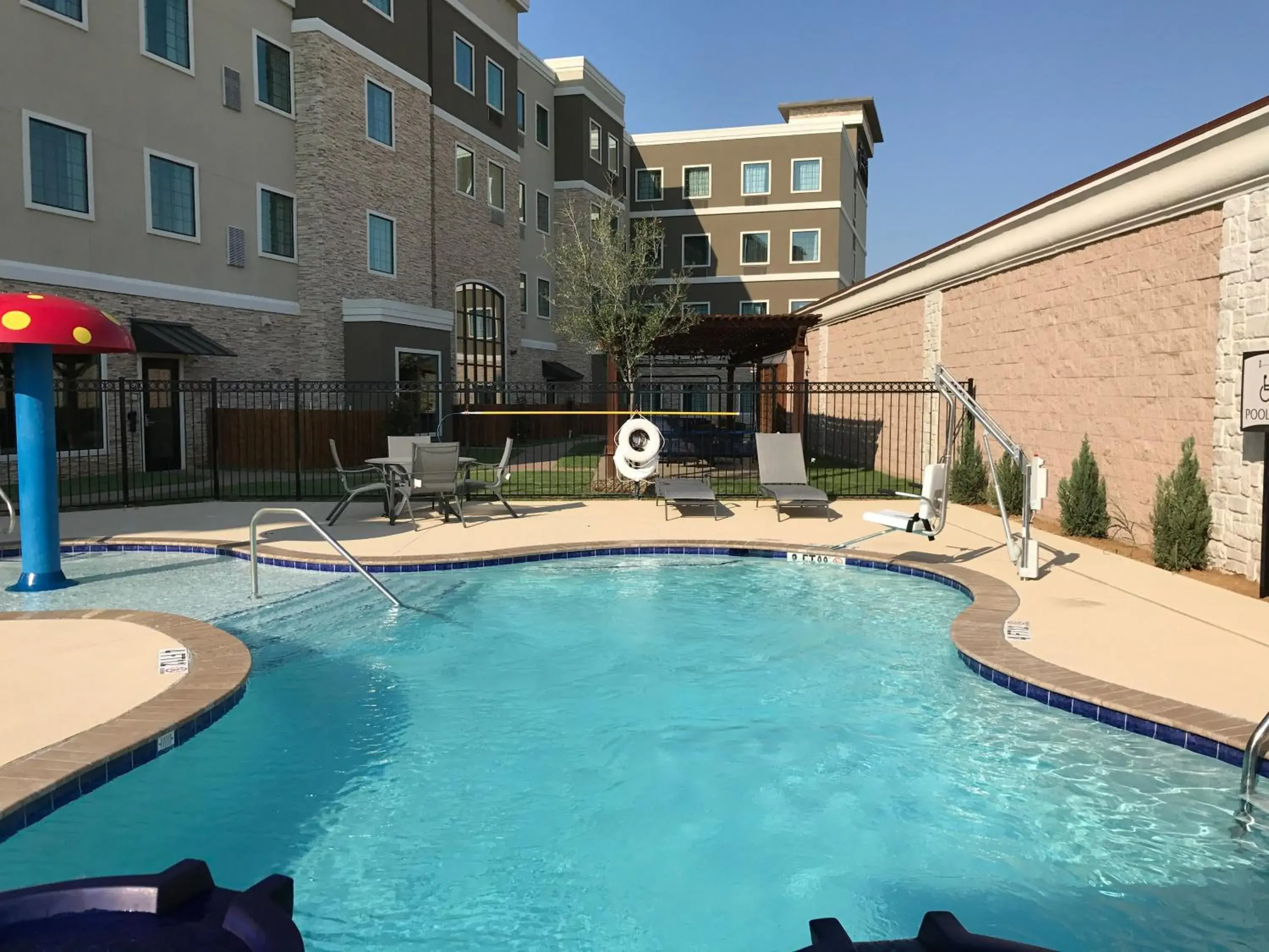 Swimming pool in Staybridge Suites Plano - The Colony by IHG Swimming pool in Staybridge Suites Plano - The Colony by IHG