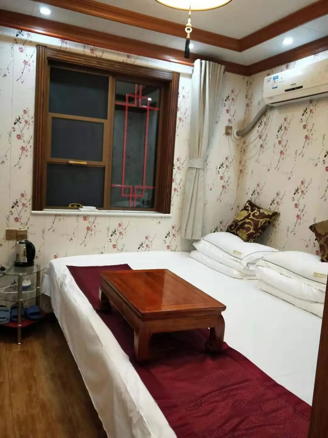 Bed in Huangyaguan Great Wall Li Bo Home Hotel