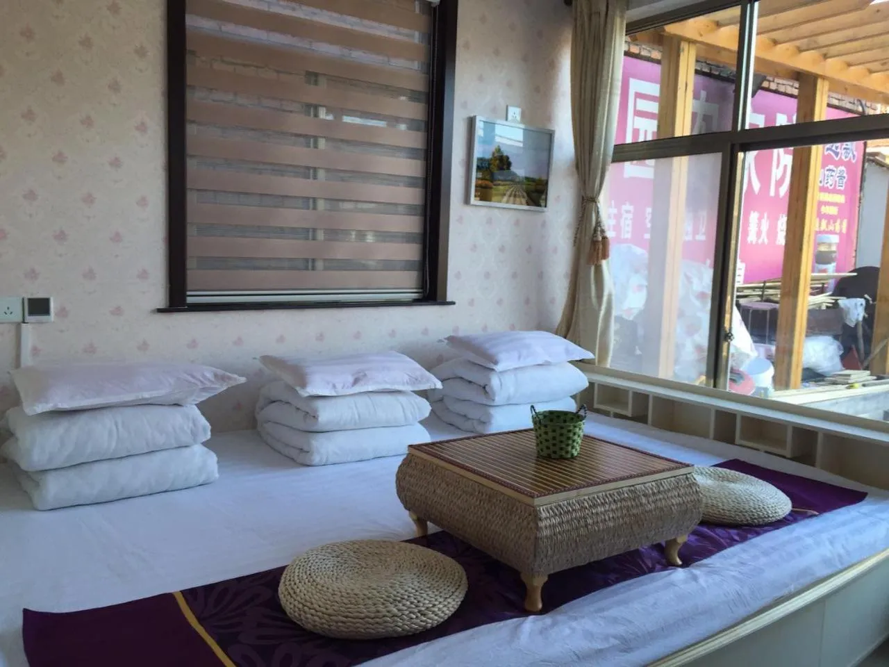 Bed in Huangyaguan Great Wall Li Bo Home Hotel