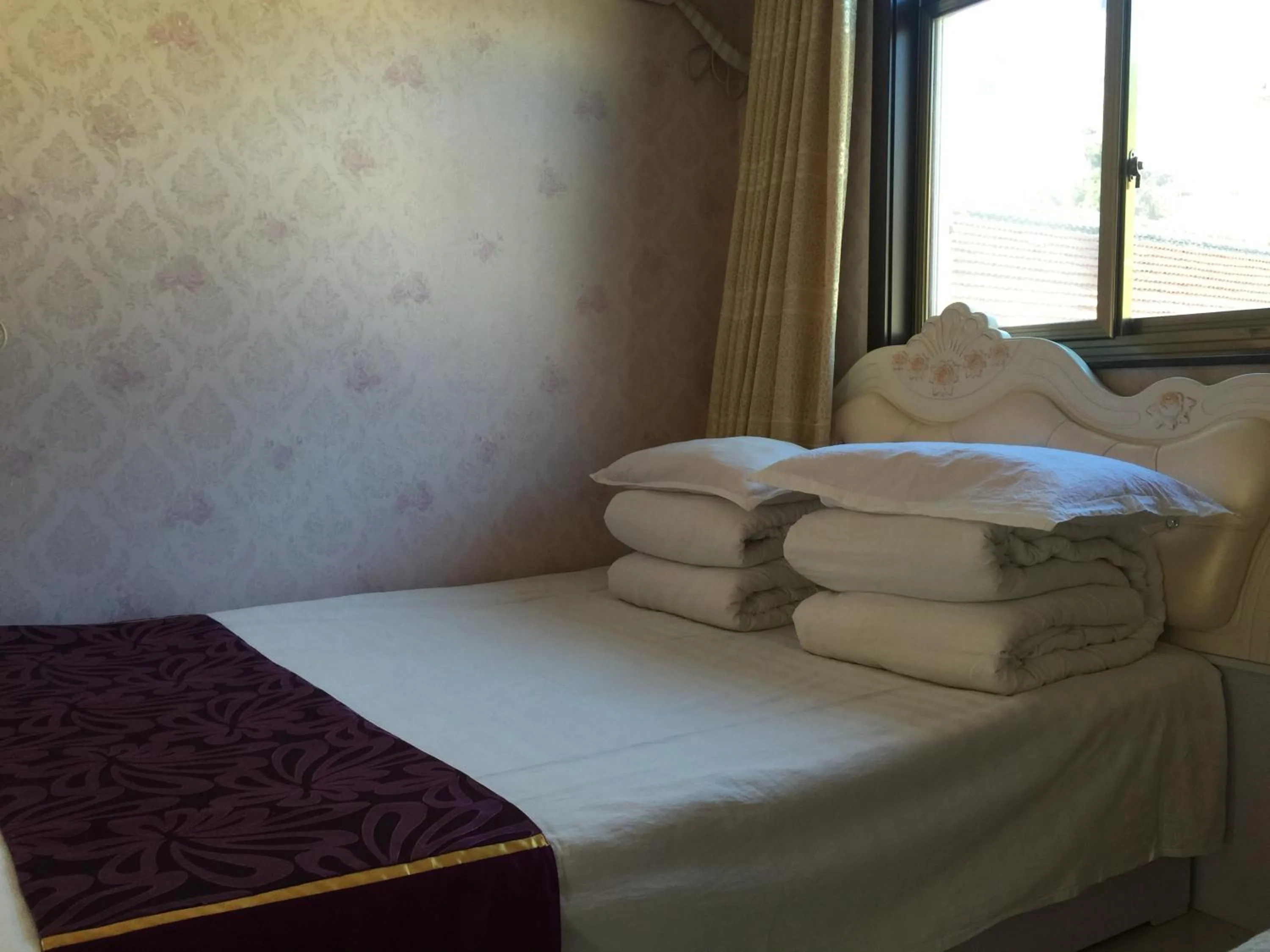Bed in Huangyaguan Great Wall Li Bo Home Hotel