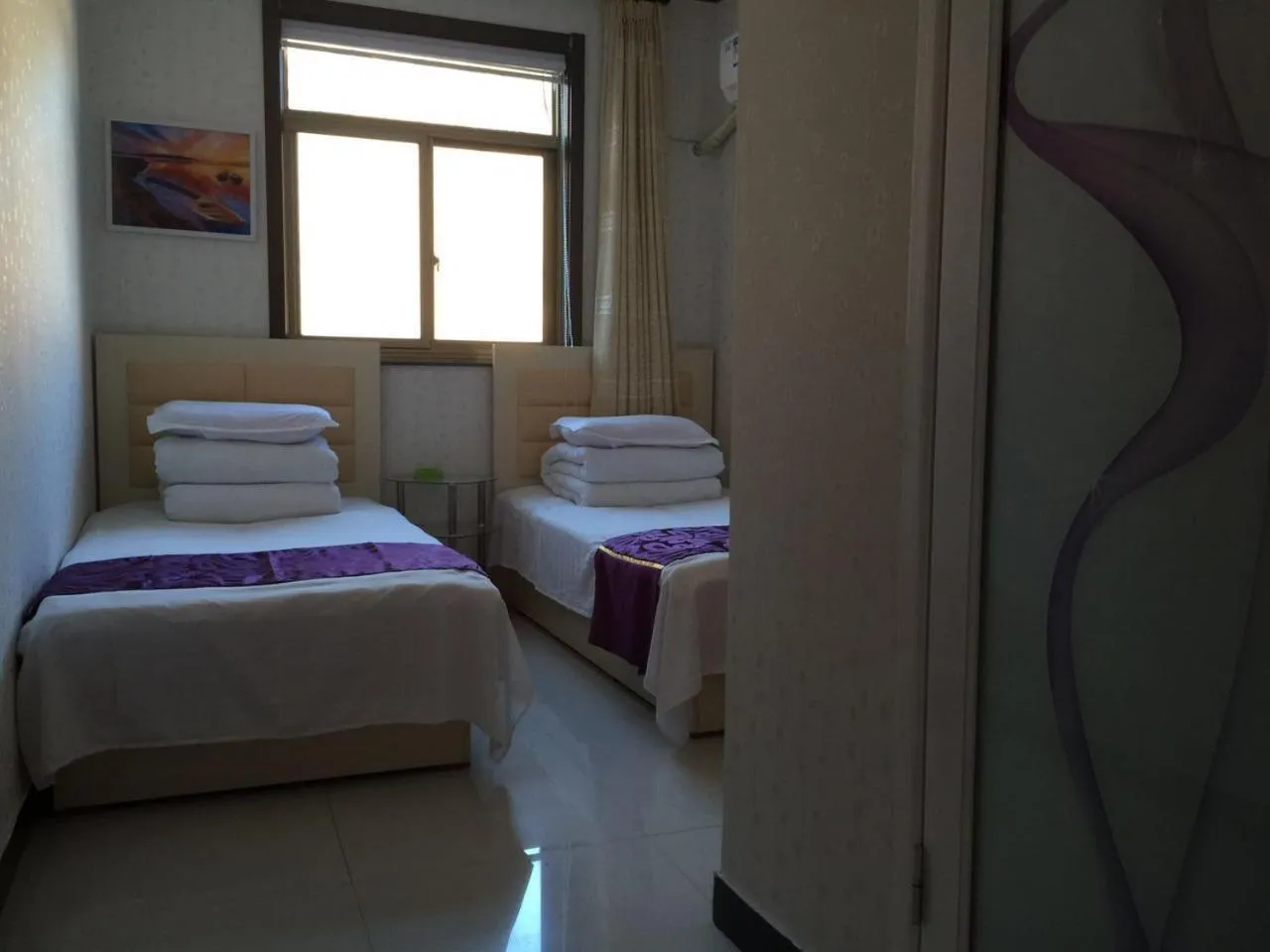 Bed in Huangyaguan Great Wall Li Bo Home Hotel