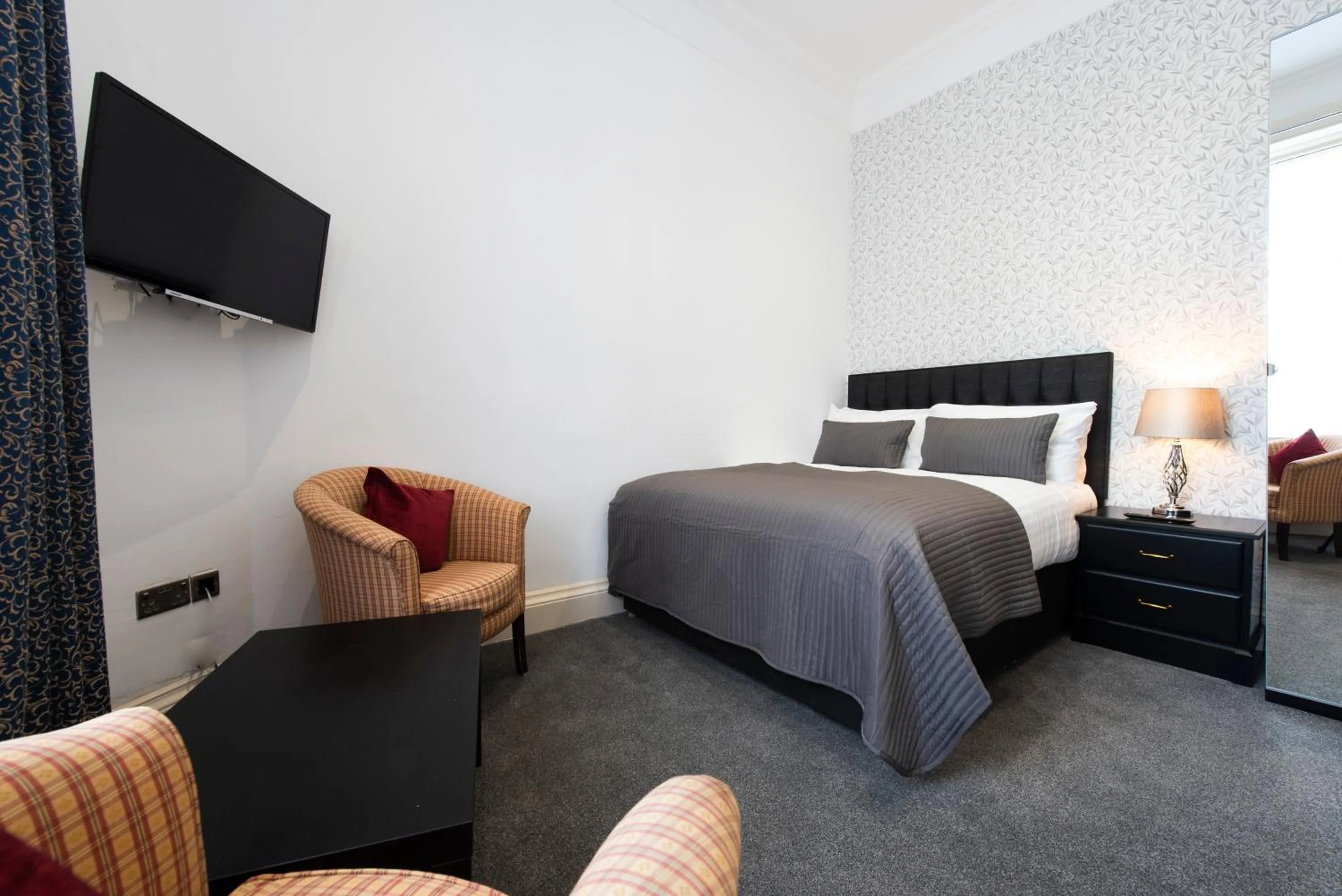 Bed in Grosvenor Suites