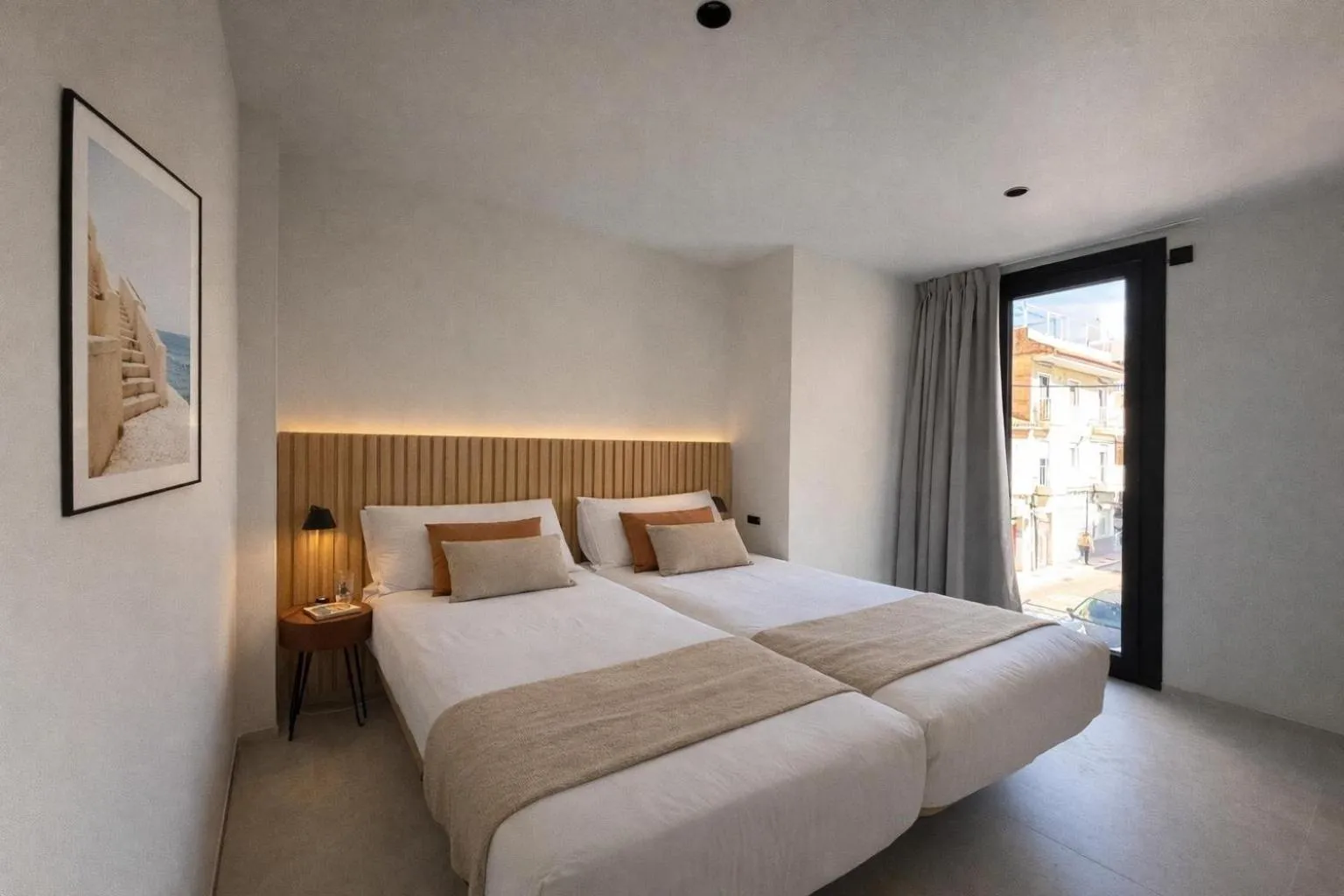 Bed in Hugo Beach Hotel & Apartments