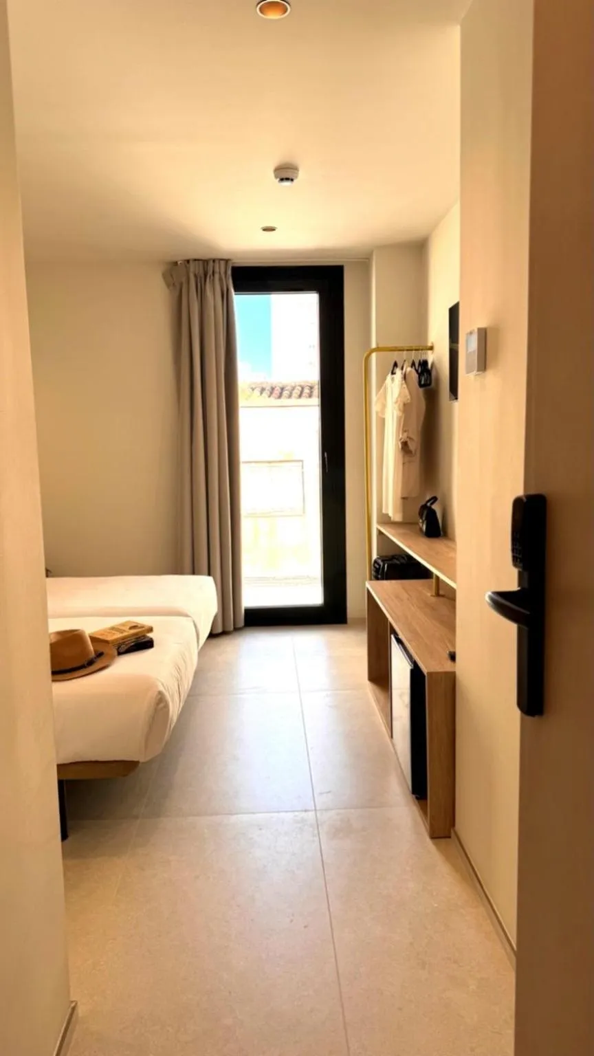 Bed in Hugo Beach Hotel & Apartments