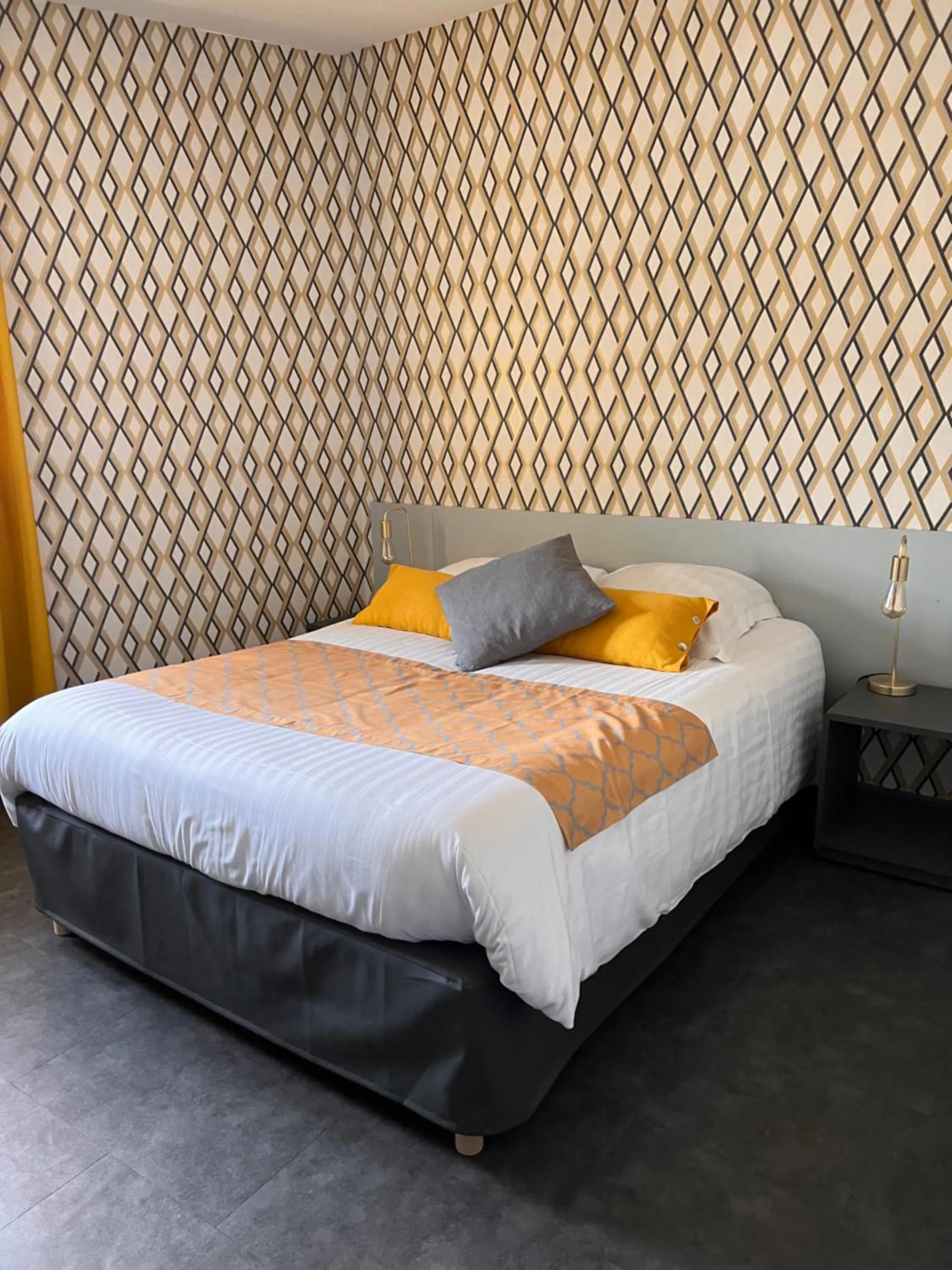 Bed in Hotel Alpes Cevennes