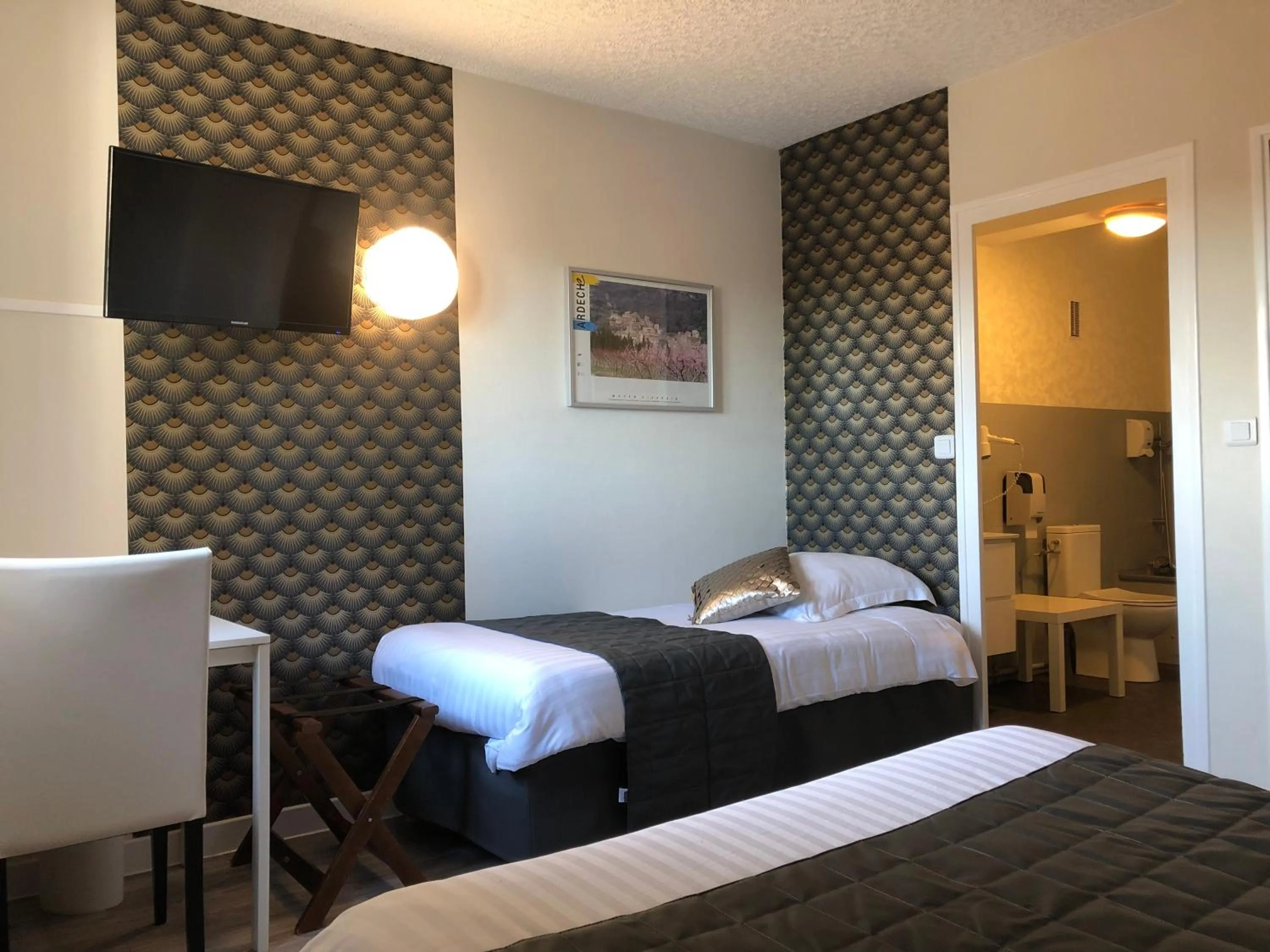 Photo of the whole room, Bed in Hotel Alpes Cevennes