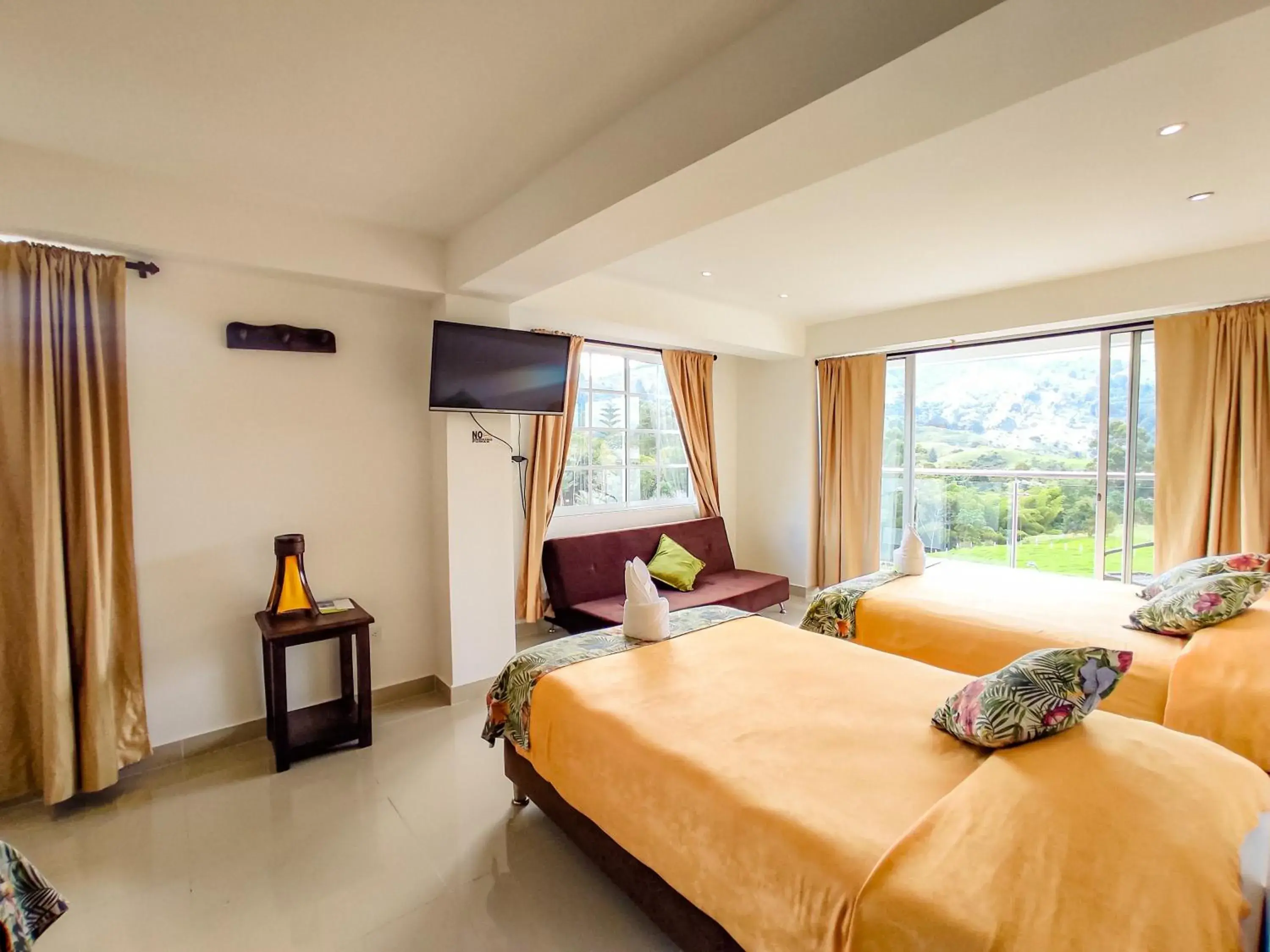 Family Room with Mountain View in Hotel Boutique Palmas de Salento Family Room with Mountain View in Hotel Boutique Palmas de Salento