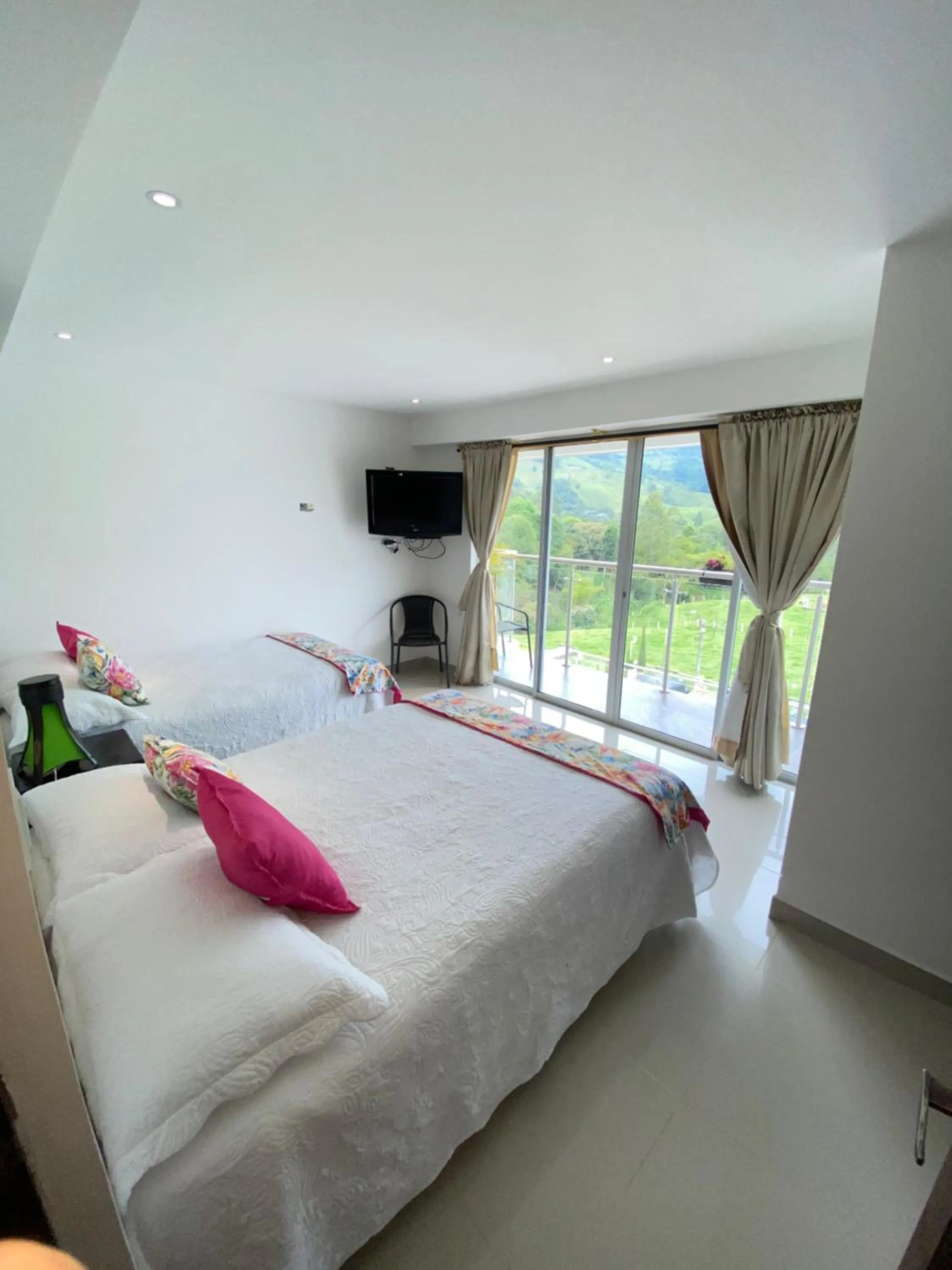 Photo of the whole room, Bed in Hotel Boutique Palmas de Salento