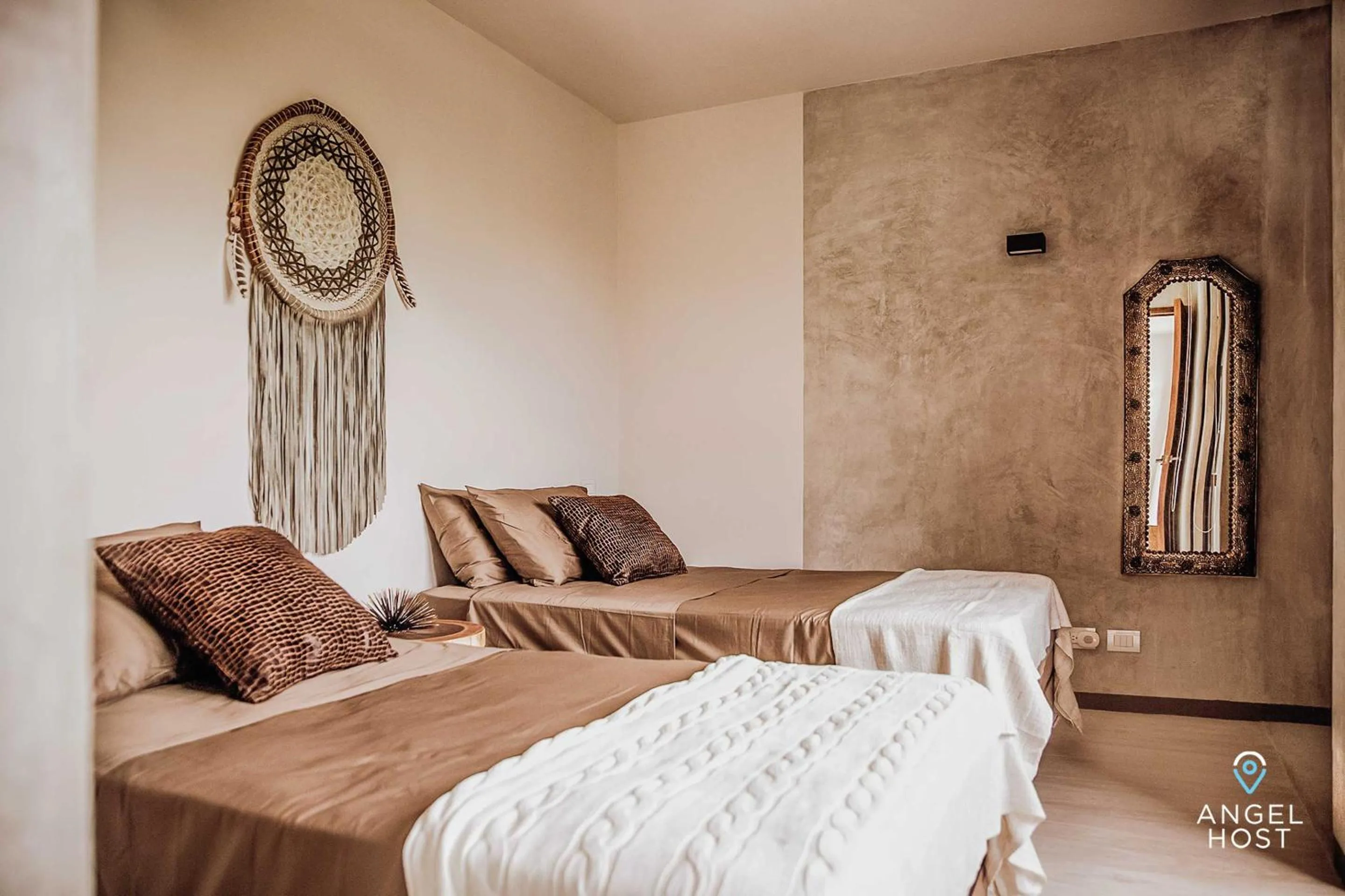 Bed in Chic Suites in the Heart of Tulum by Stella Rentals