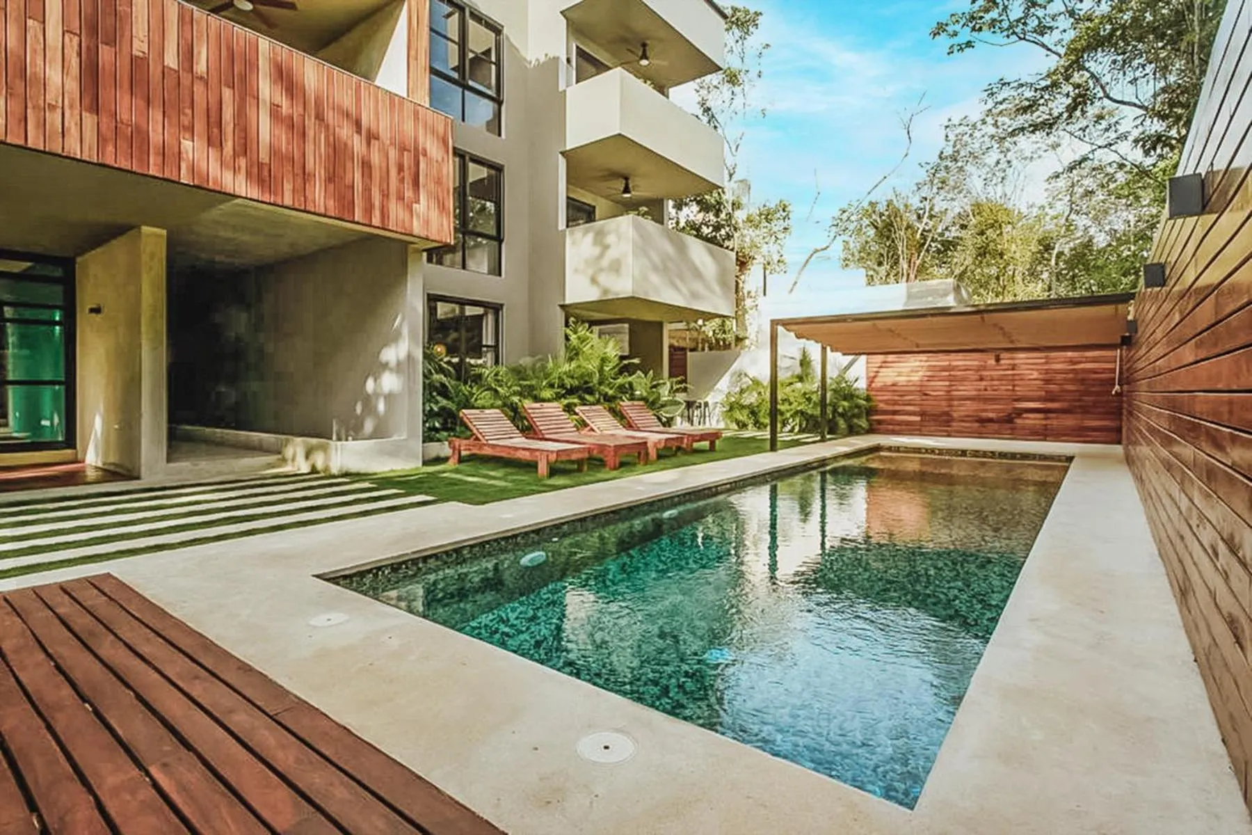 Swimming pool in Chic Suites in the Heart of Tulum by Stella Rentals