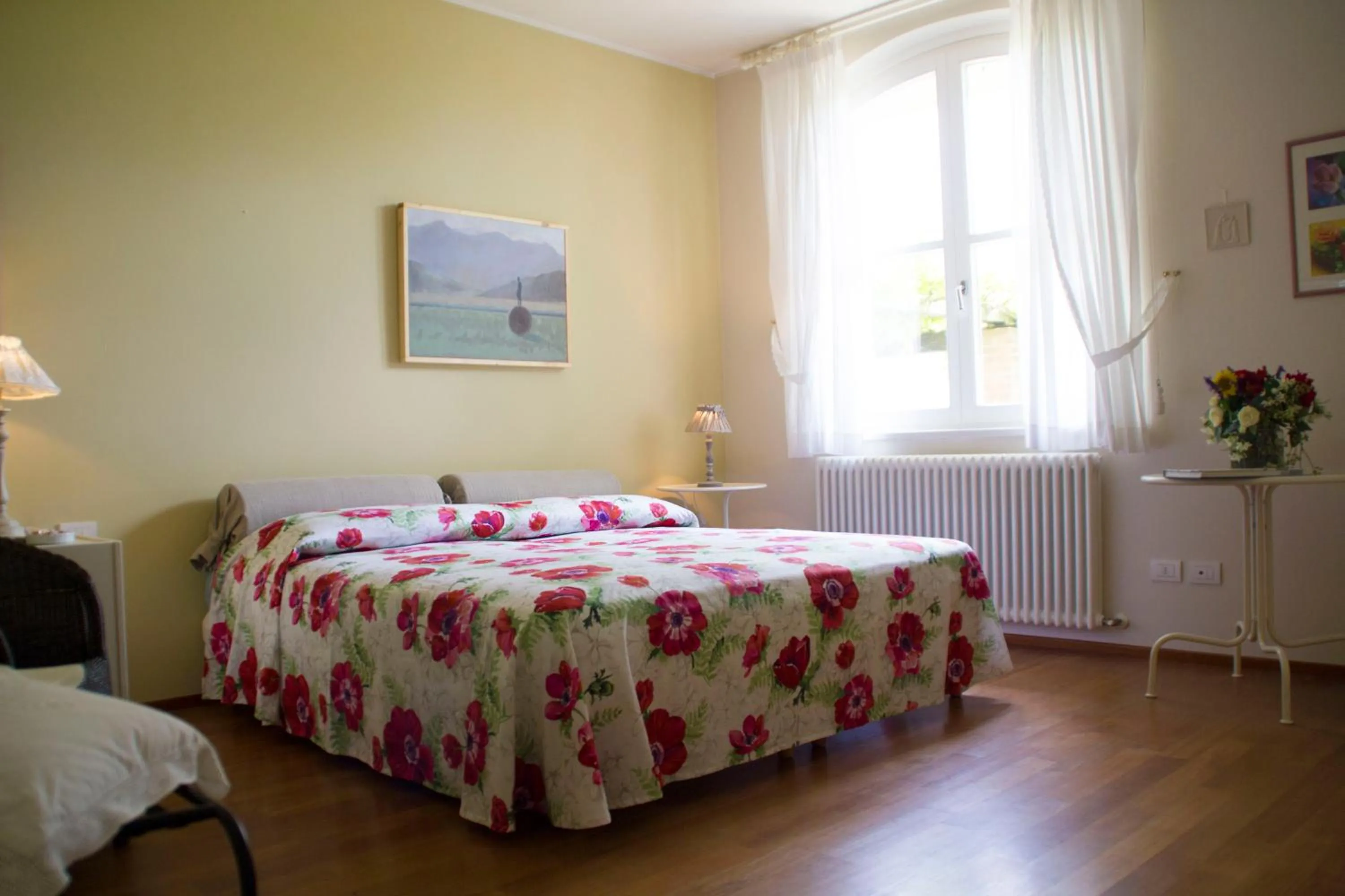 Photo of the whole room, Bed in Il Giardino delle Rose